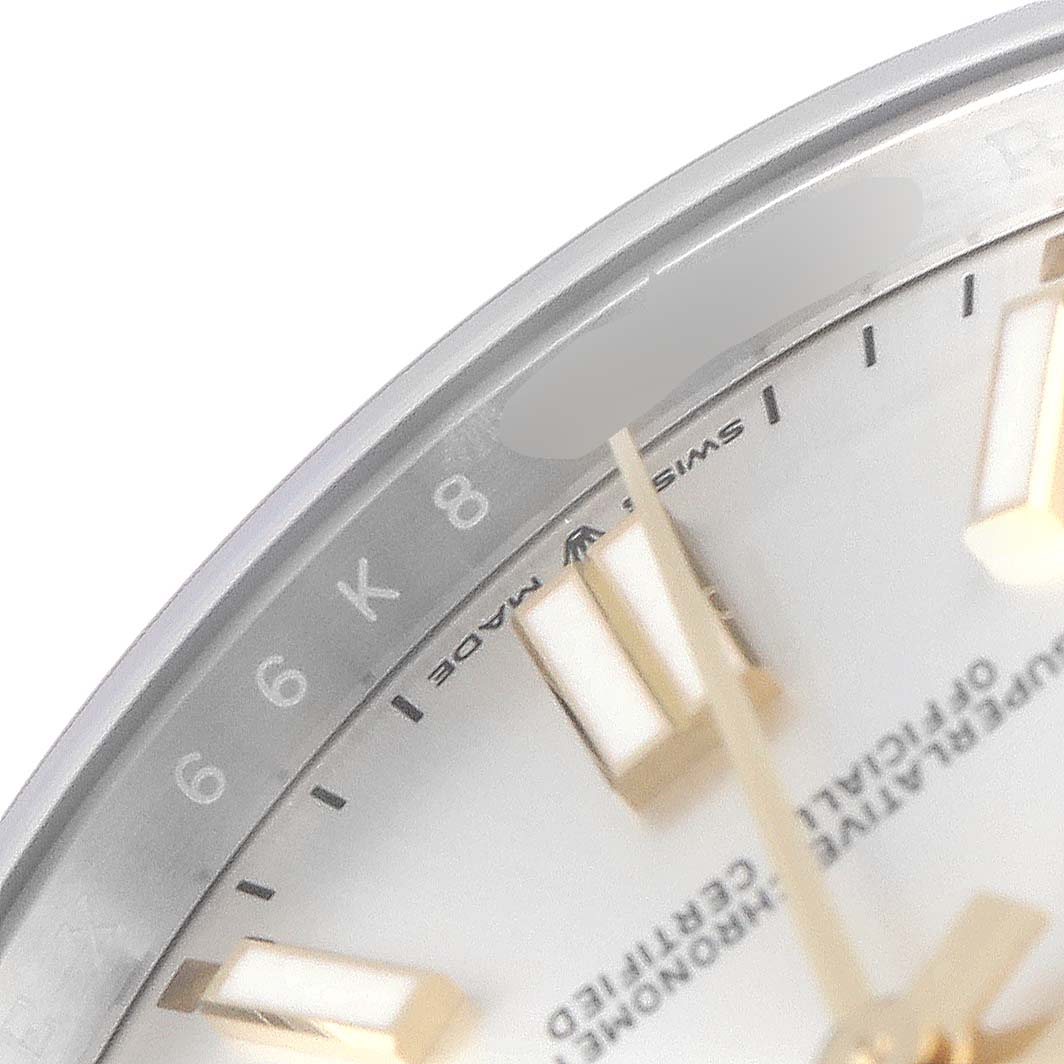 This image shows a close-up of the dial and part of the bezel of a Rolex Oyster Perpetual 124300 Men's Stainless Steel Silver Dial 124300 Men's Stainless Steel Silver Dial watch, highlighting the numerals and markers.