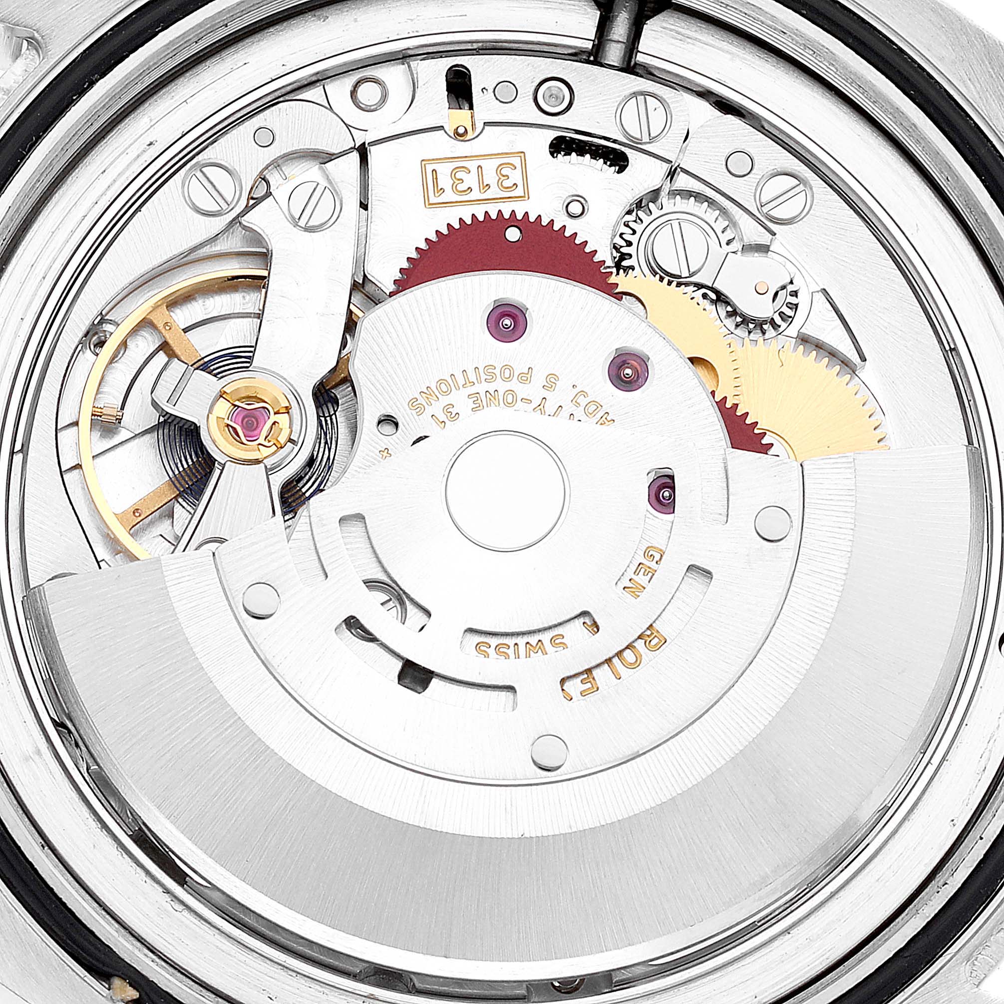 This image shows a close-up view of the movement and internal mechanism of the Rolex Air-King 116900 Men's Stainless Steel Black Dial 116900 Men's Stainless Steel Black Dial watch.