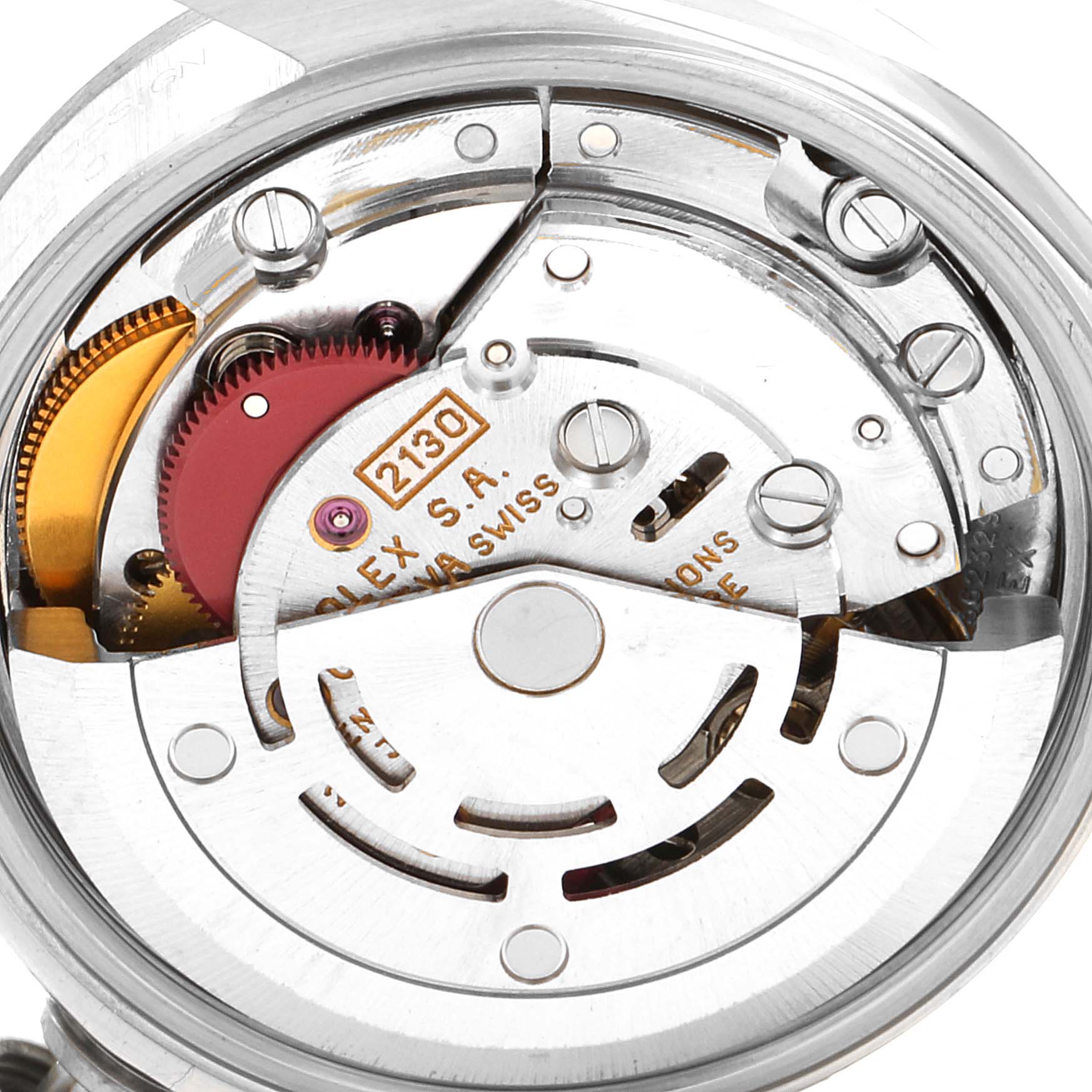 This image shows a close-up of the internal mechanical movement of the Rolex Oyster Perpetual 67180 Women's Stainless Steel Pink Dial 67180 Women's Stainless Steel Pink Dial watch.
