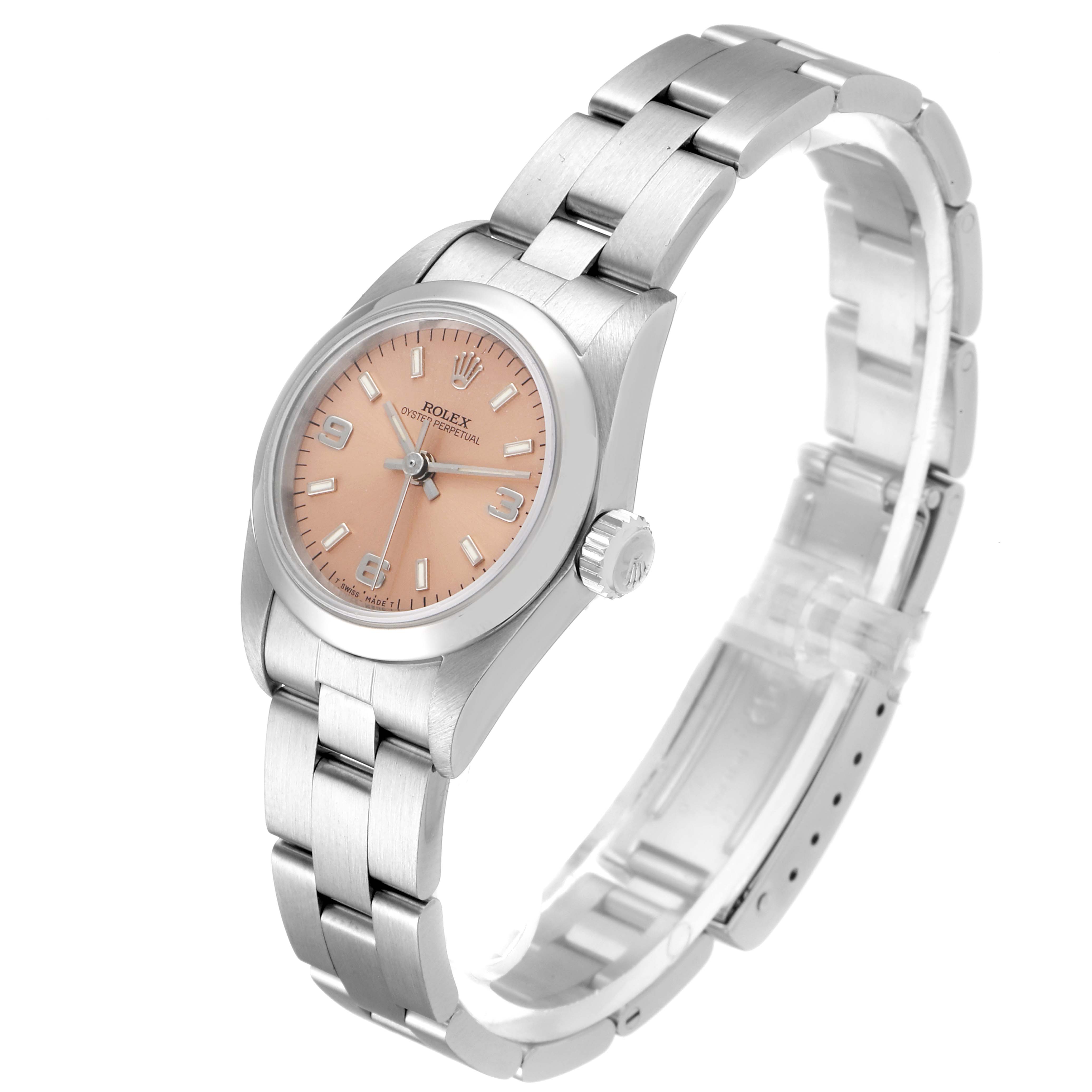 The image shows a front and side view of a Rolex Oyster Perpetual 67180 Women's Stainless Steel Pink Dial 67180 Women's Stainless Steel Pink Dial watch, highlighting the dial, bracelet, and bezel.