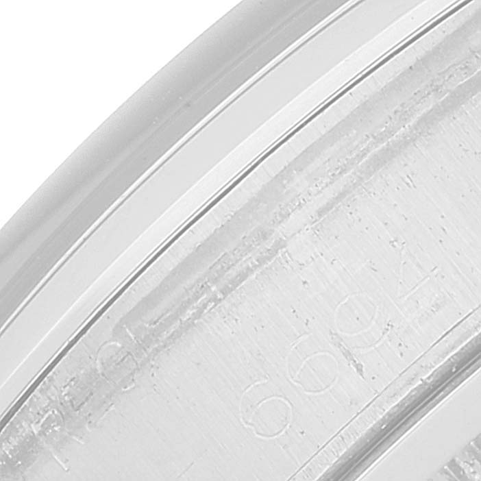 This image shows a close-up of the inscription on the caseback edge of a Rolex Vintage Collection 6694 Men's Stainless Steel Black Dial 6694 Men's Stainless Steel Black Dial model.