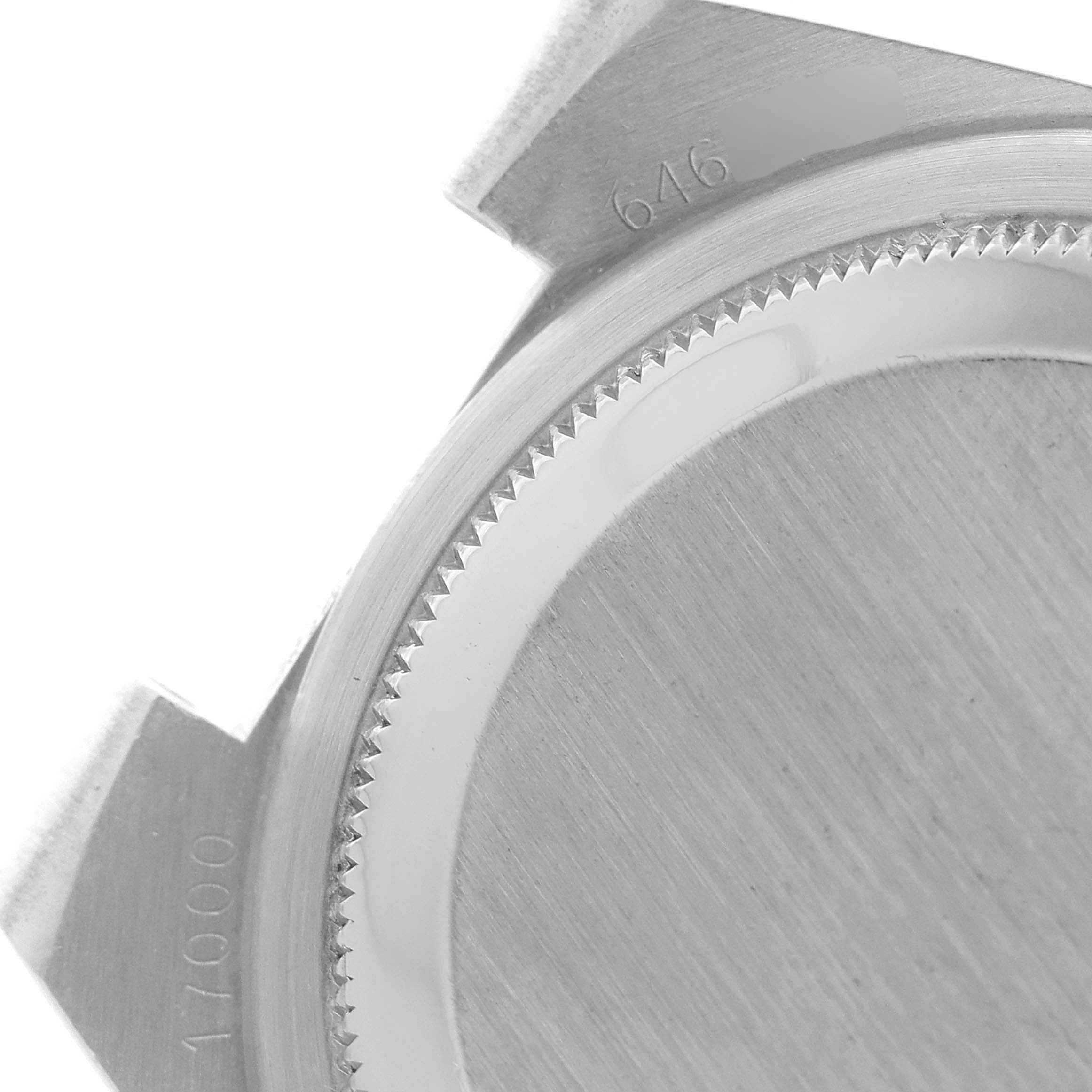 The image shows the back case of a Rolex Oysterquartz 17000 Men's Stainless Steel Silver Dial 17000 Men's Stainless Steel Silver Dial watch, highlighting the serial and reference numbers.