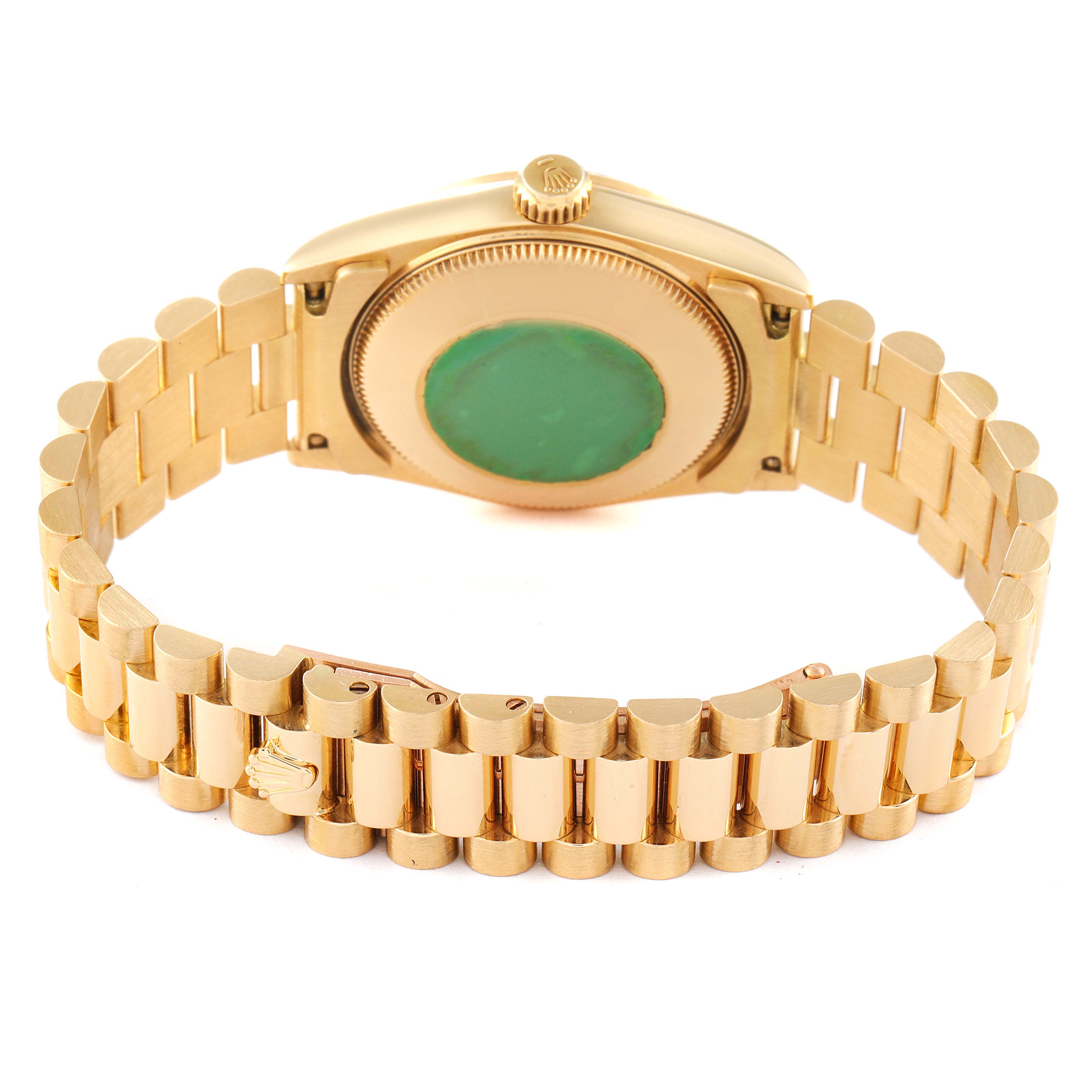 This image shows the back view of the Rolex President 68278 Women
s Yellow Gold Champagne Dial 68278 Women
s Yellow Gold Champagne Dial model watch, highlighting its gold bracelet and case back.