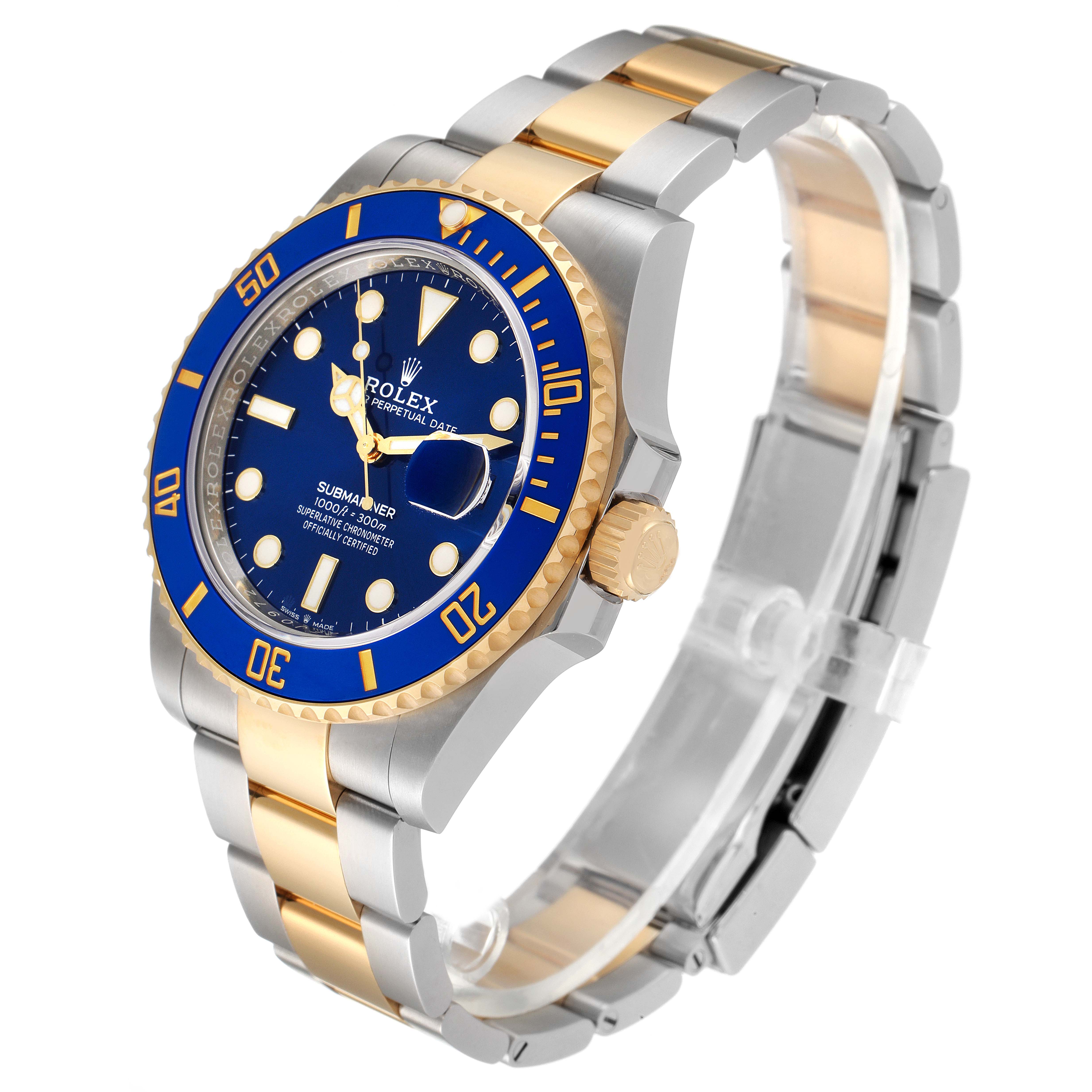 The image shows a Rolex Submariner 126613 Men's Steel and Gold (two tone) Blue Dial 126613 Men's Steel and Gold (two tone) Blue Dial model watch at a slight angle, highlighting its blue dial, two-tone bracelet, and bezel.