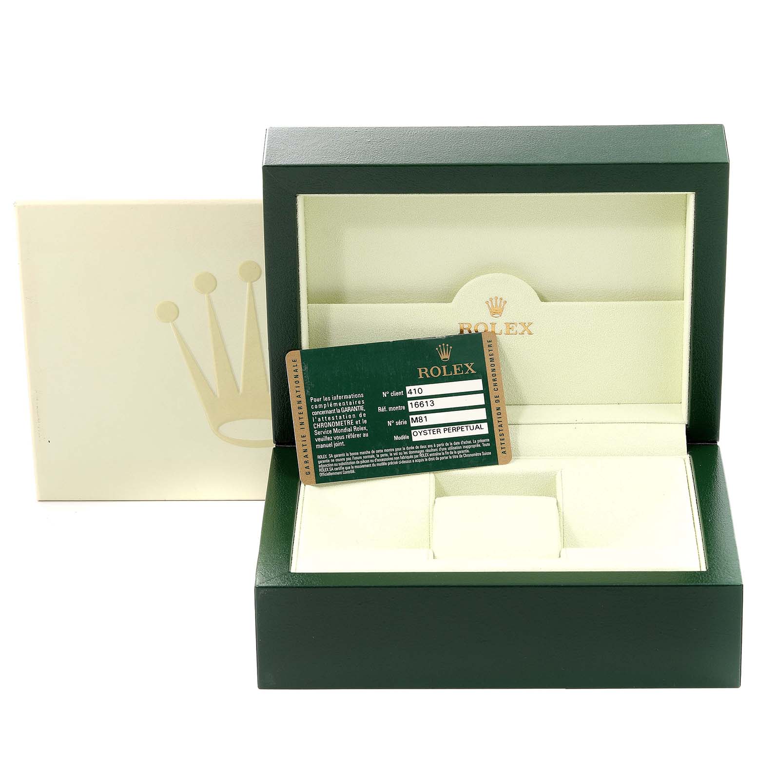 This image shows the open box and warranty card for a Rolex Submariner 16613 Men
s Stainless Steel Blue Dial 16613 Men
s Stainless Steel Blue Dial watch.