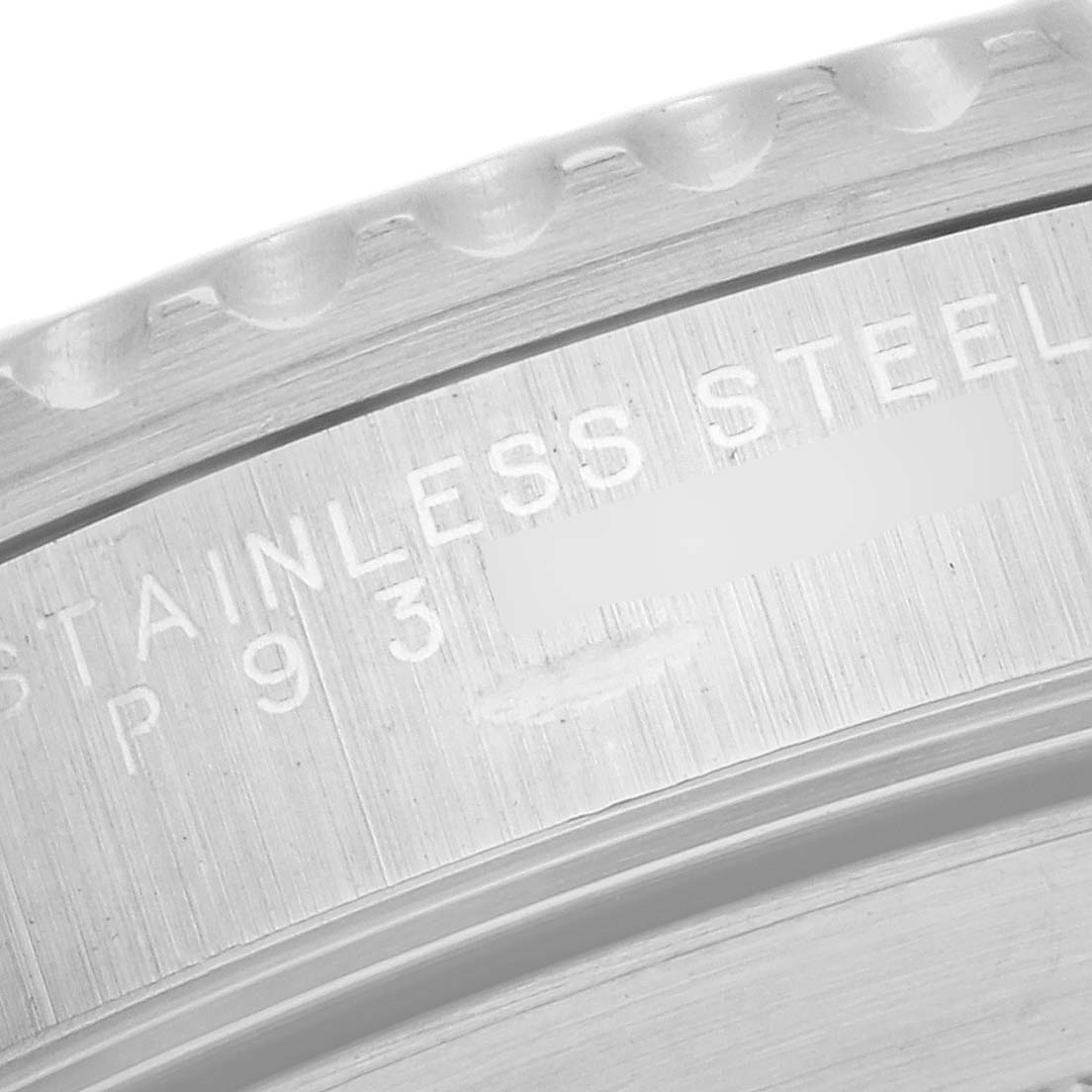 This is a close-up image of the stainless-steel bezel of a Rolex Submariner 14060 Men
s Stainless Steel Black Dial 14060 Men
s Stainless Steel Black Dial watch.