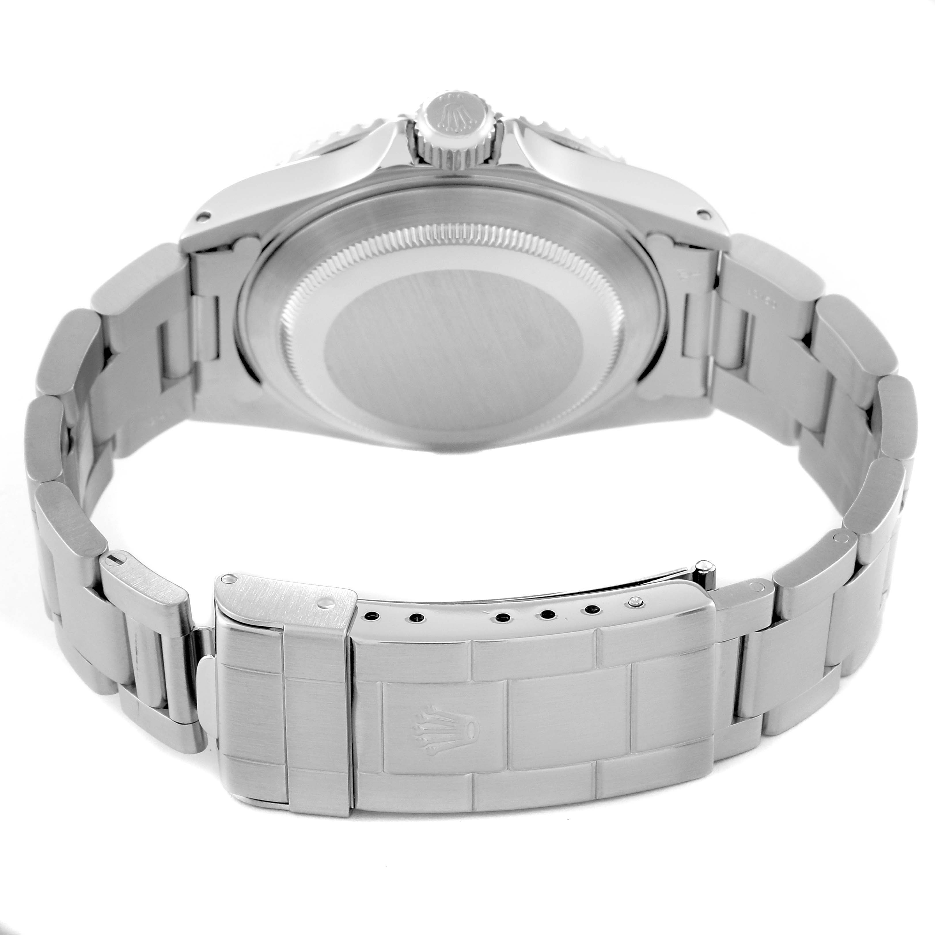 The image shows the back case and bracelet clasp of a Rolex Submariner 14060 Men
s Stainless Steel Black Dial 14060 Men
s Stainless Steel Black Dial watch from a rear angle.