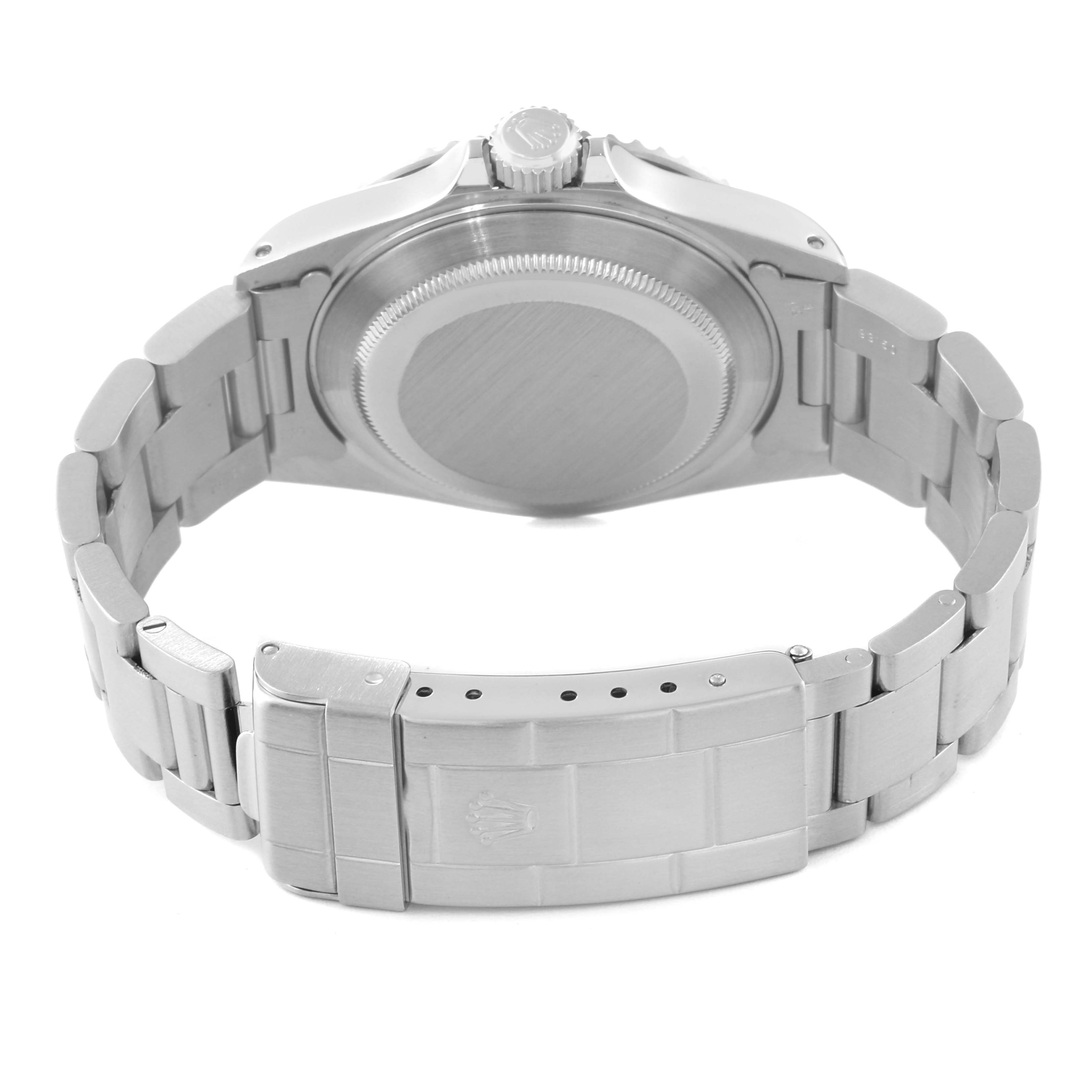 This image shows the back case and stainless steel bracelet of a Rolex Submariner 14060 Men
s Stainless Steel Black Dial 14060 Men
s Stainless Steel Black Dial watch from a rear angle.