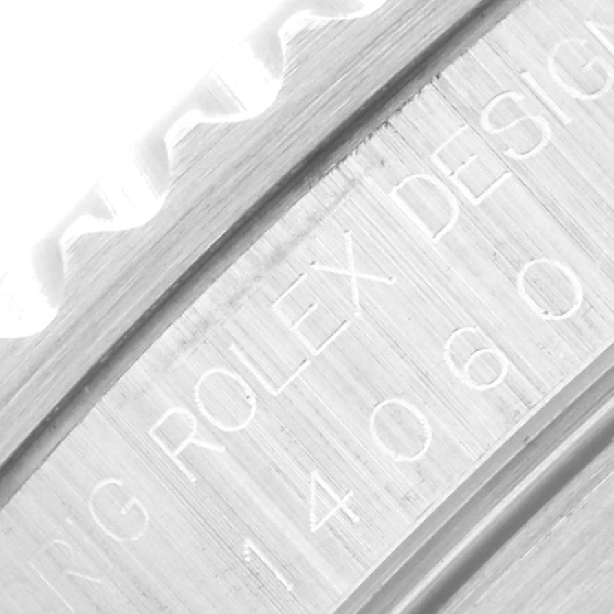 Close-up of the side of the Rolex Submariner 14060 Men
s Stainless Steel Black Dial 14060 Men
s Stainless Steel Black Dial showing the model number and engraving details.