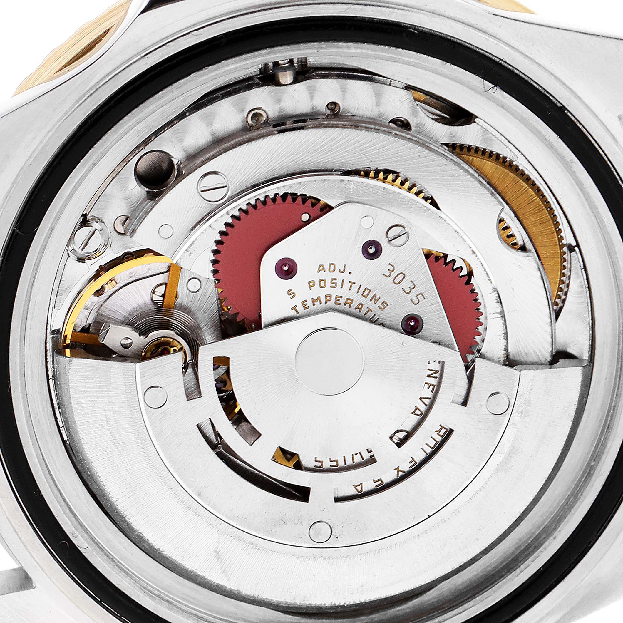 This image shows the inner mechanical components of the Rolex Submariner 16803 Men
s Steel and Gold (two tone) Blue Dial 16803 Men
s Steel and Gold (two tone) Blue Dial watch from a top-down angle.