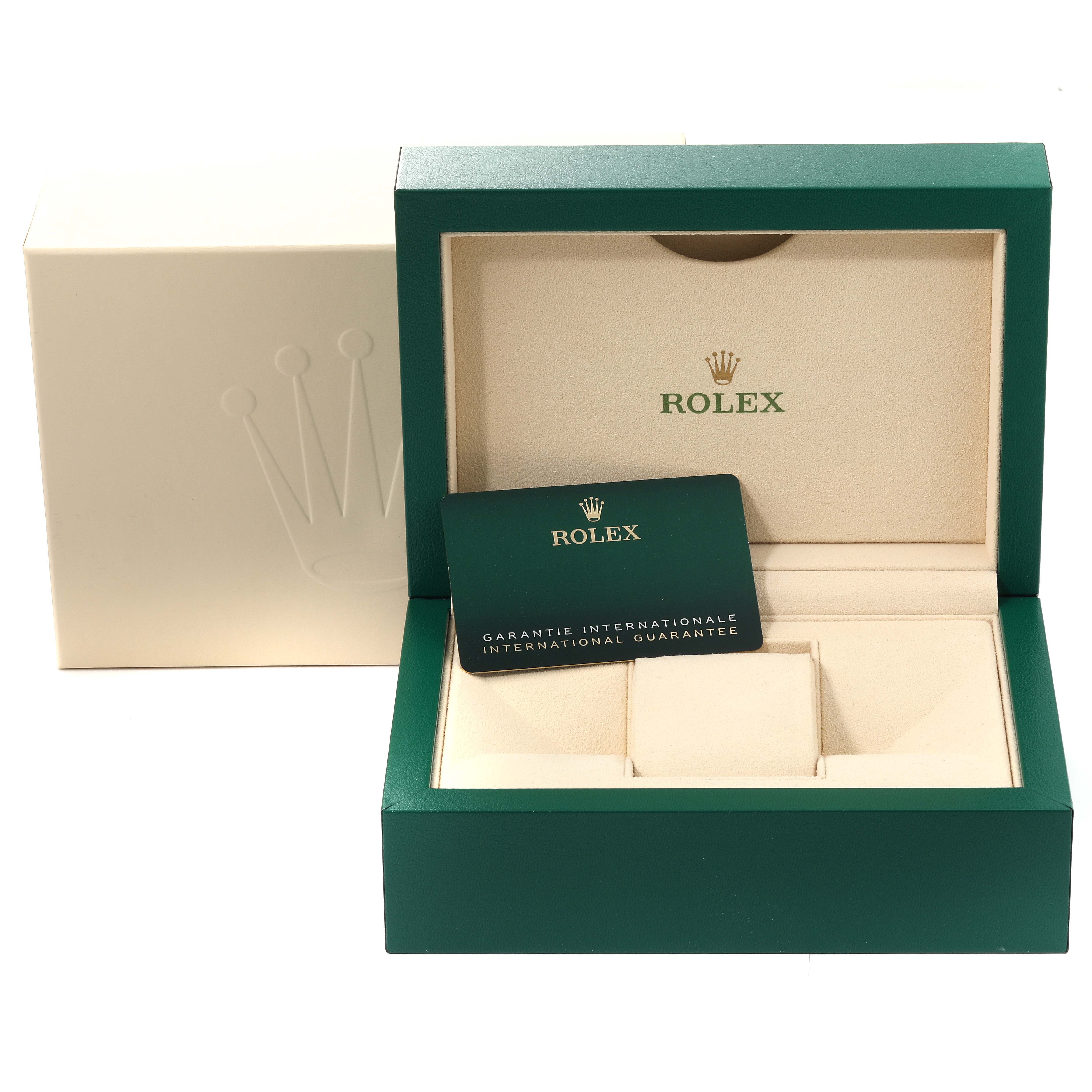 The image shows the open box and international guarantee card for a Rolex Yacht-Master 226658 Men's Yellow Gold Black Dial 226658 Men's Yellow Gold Black Dial watch.