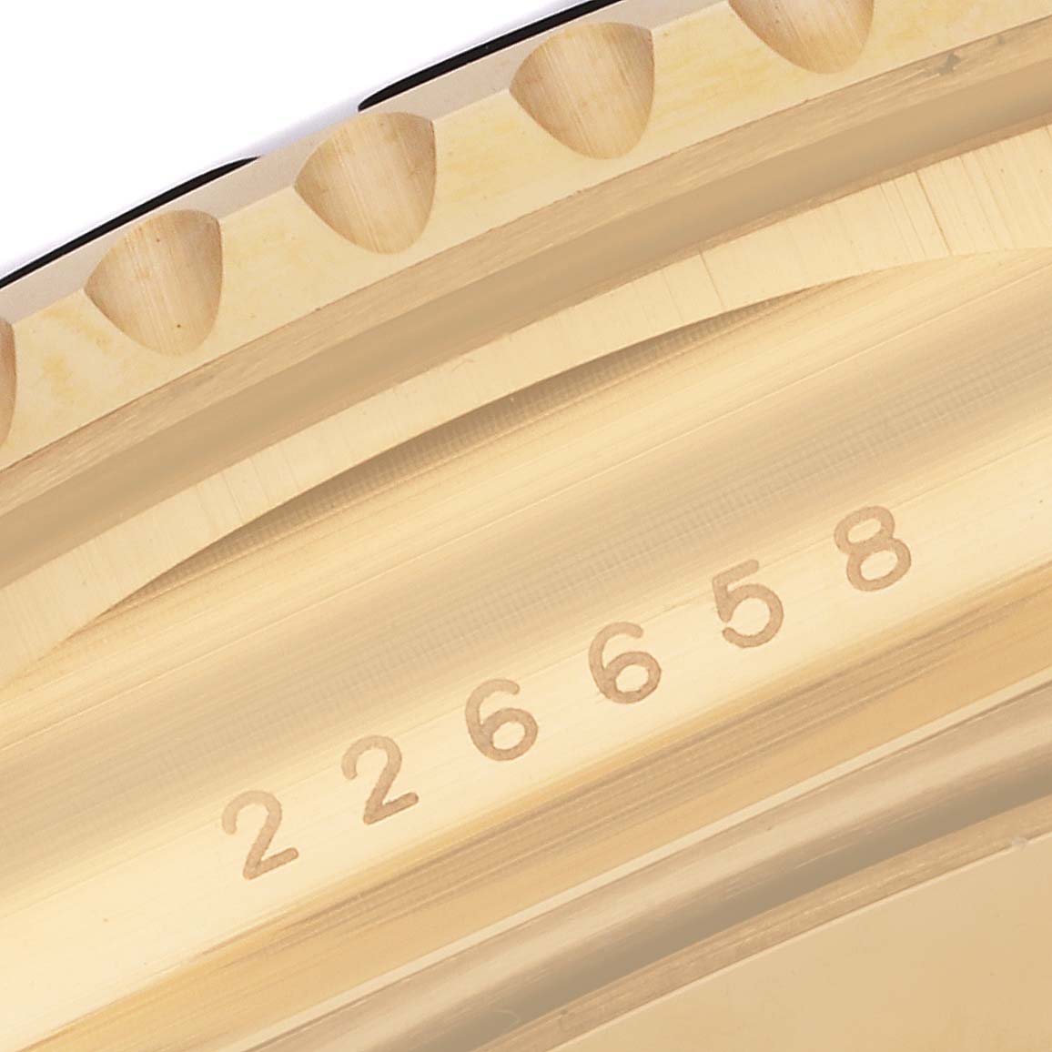 This close-up image of the Yacht-Master by Rolex shows the serial number on the case and the edge of the bezel.
