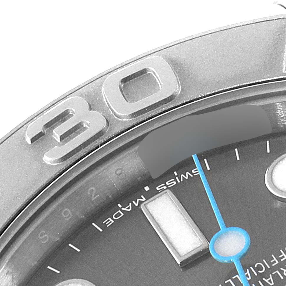 The image shows a close-up of the Rolex Yacht-Master 268622 Men's Stainless Steel Grey Dial 268622 Men's Stainless Steel Grey Dial watch, highlighting the bezel with the number “30” and part of the dial with the word "Swiss Made."