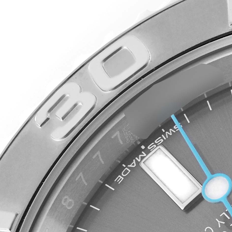 This close-up angle shows the bezel with the "30" marker, part of the dial, and the minute hand of the Rolex Yacht-Master 116622 Men's Stainless Steel Grey Dial 116622 Men's Stainless Steel Grey Dial watch.