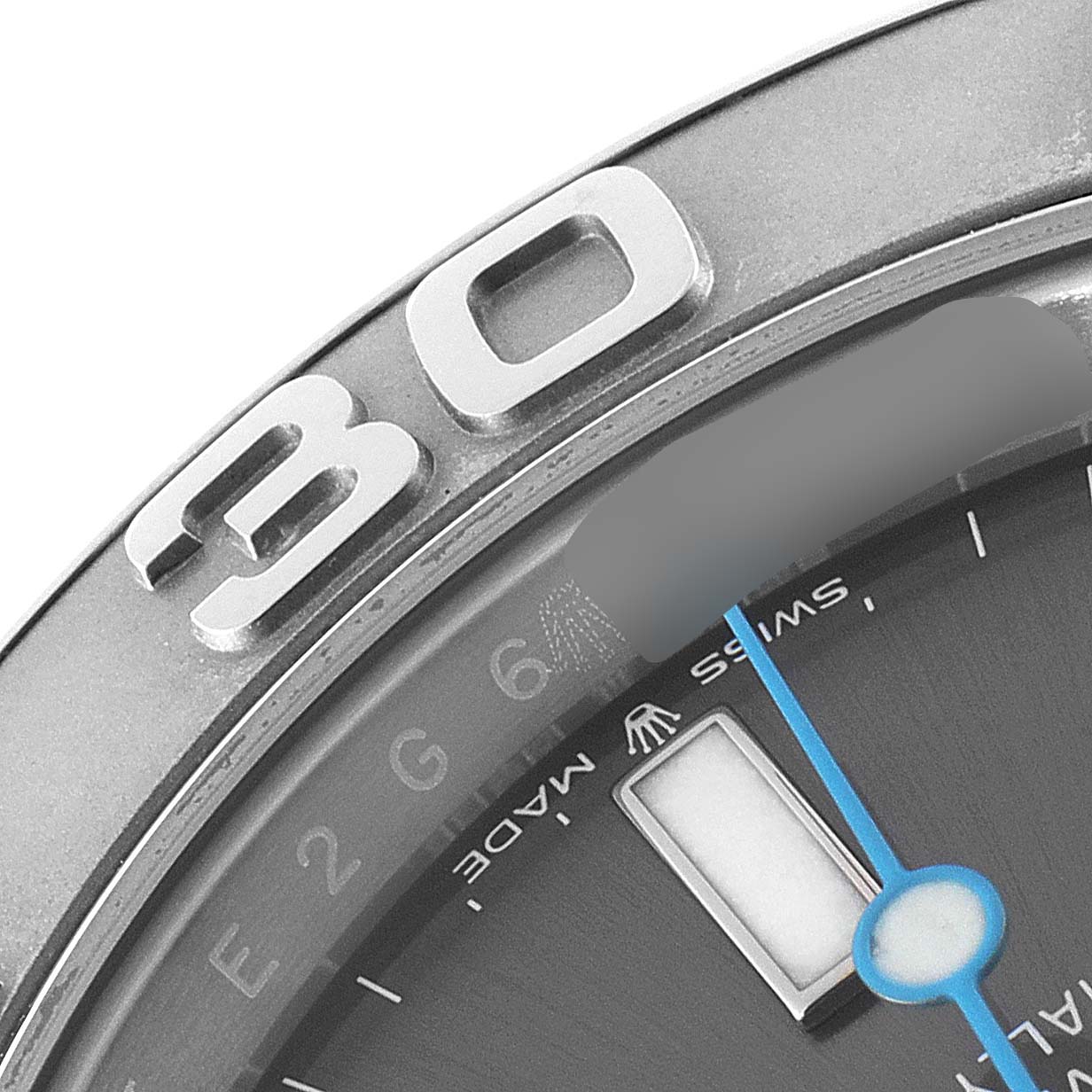 This is a close-up view of the bezel and part of the dial of a Rolex Yacht-Master 126622 Men's Platinum Grey Dial 126622 Men's Platinum Grey Dial watch, showcasing the "30" marker.
