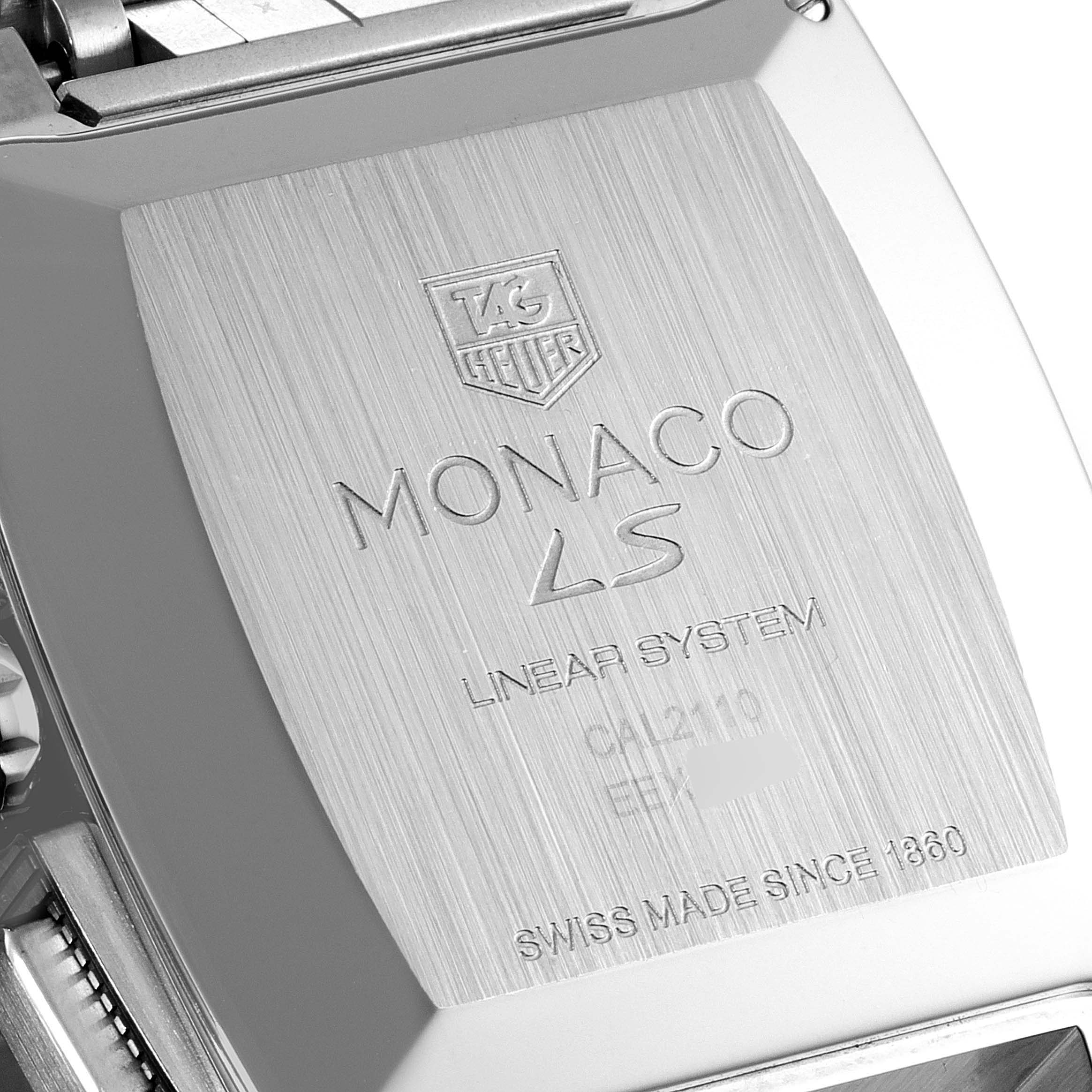 The image shows the back side and engraved details of the Tag Heuer Monaco CAL2110.BA0781 Men's Stainless Steel Black Dial CAL2110.BA0781 Men's Stainless Steel Black Dial watch.
