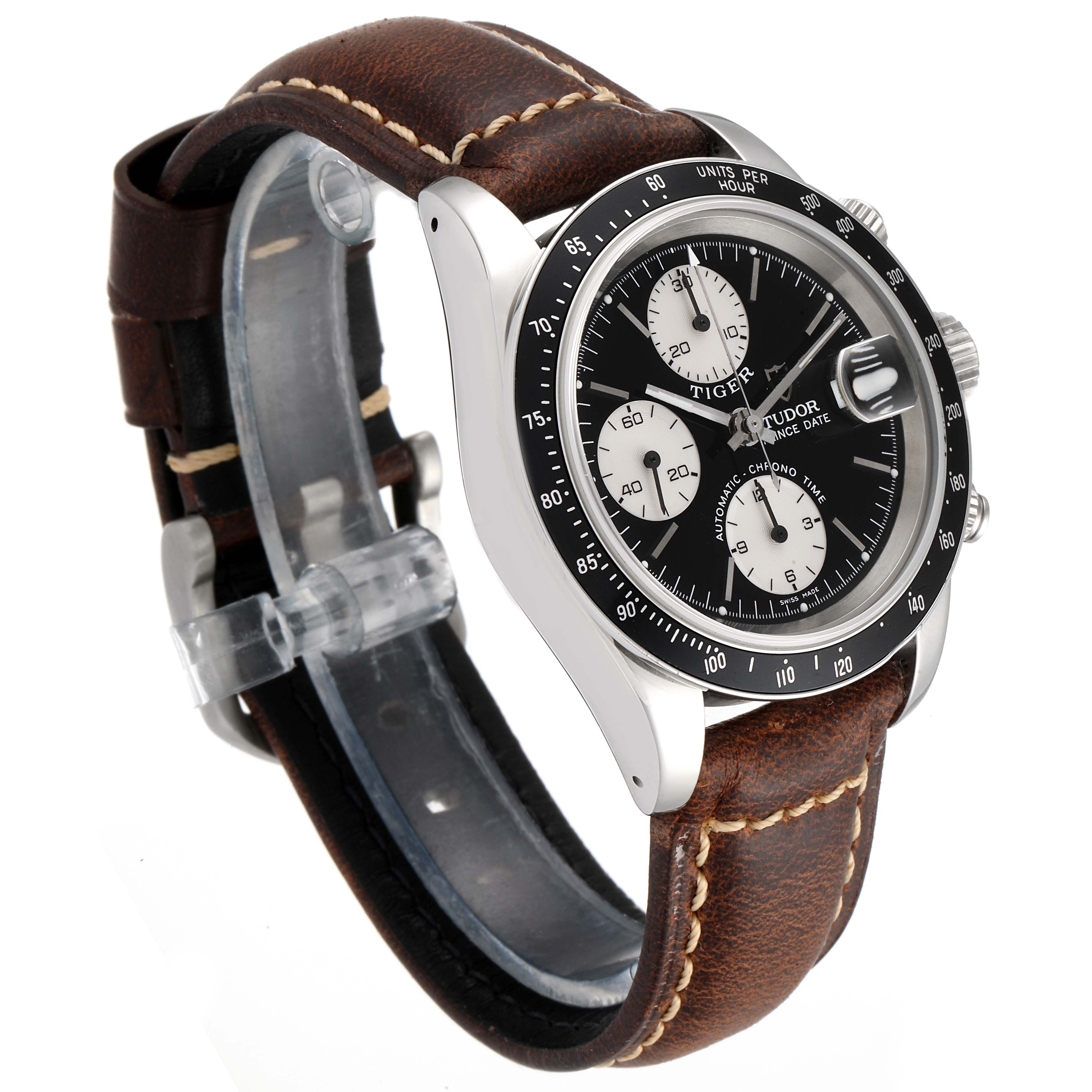 The image shows a Tudor Tiger 79260 Men's Stainless Steel Black Dial 79260 Men's Stainless Steel Black Dial model watch at a three-quarter angle, highlighting its black dial, sub-dials, bezel, and brown leather strap.