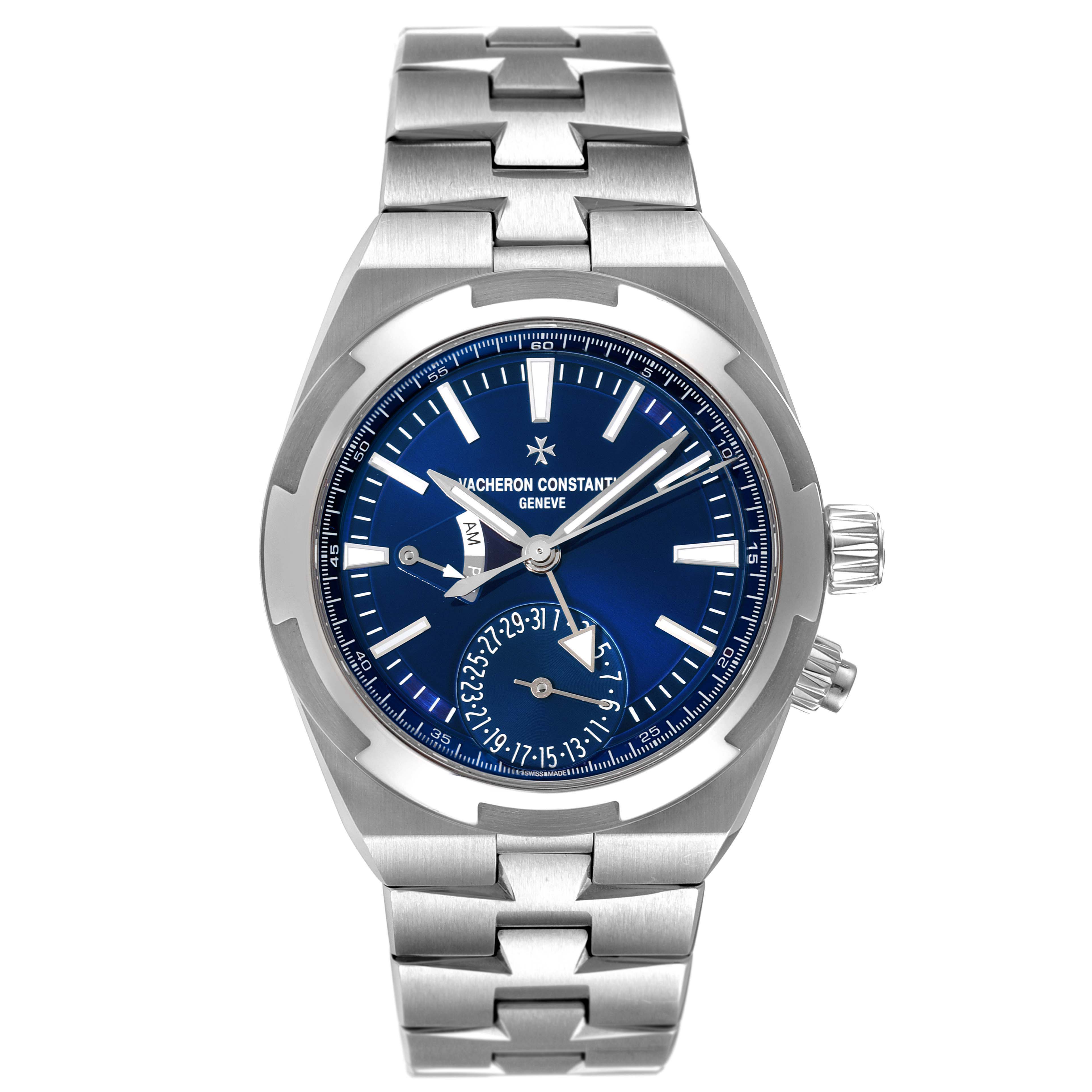 The image shows a front view of the Vacheron Constantin Overseas 7900V/110A-B334 Men
s Stainless Steel Blue Dial 7900V/110A-B334 Men
s Stainless Steel Blue Dial watch, displaying the blue dial, hands, and stainless steel bracelet.