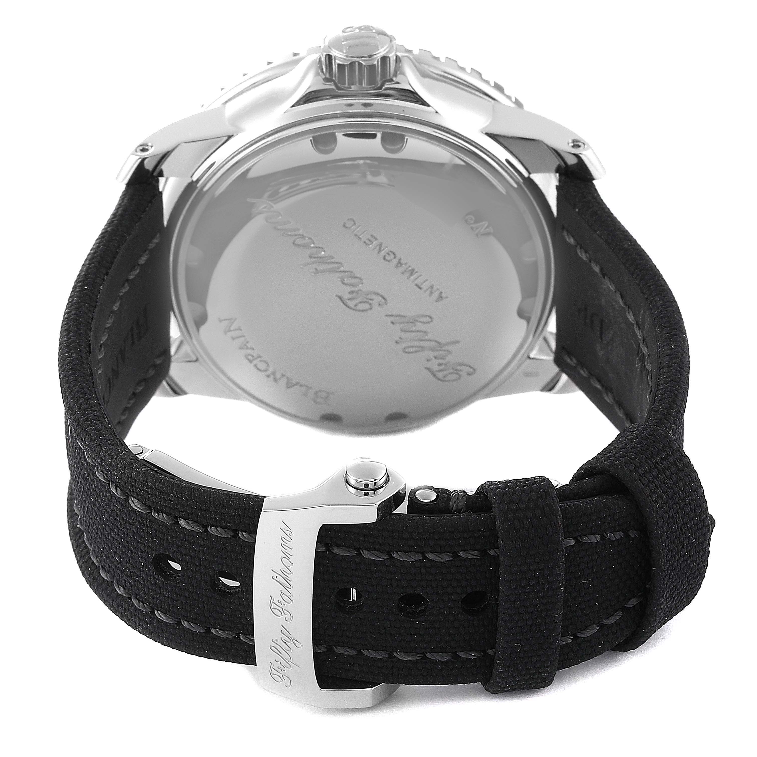 The image shows the back of the Blancpain Fifty Fathoms 5015-1130-52A Men's Stainless Steel Black Dial 5015-1130-52A Men's Stainless Steel Black Dial watch, highlighting the case back and fabric strap with visible stitching.