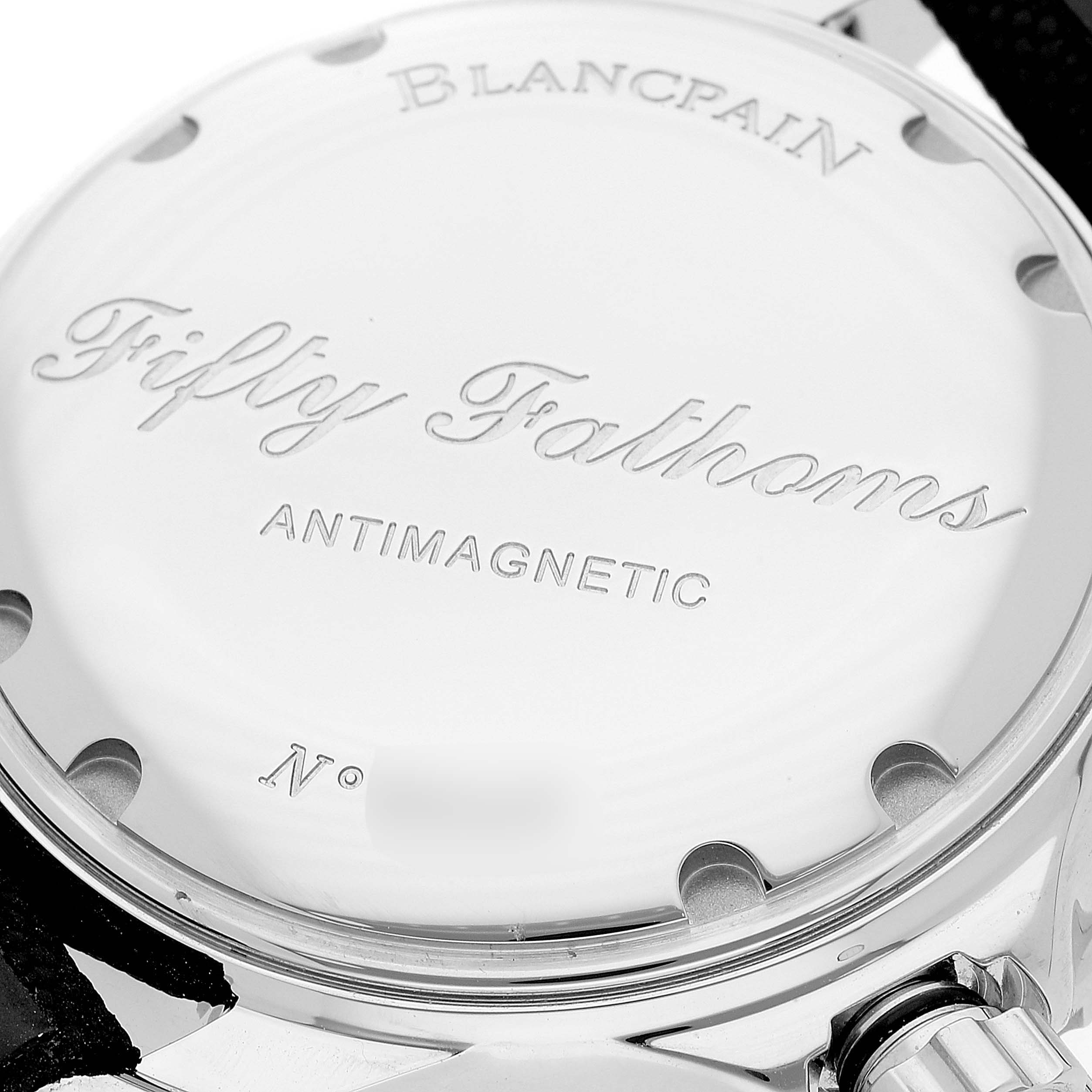 The image shows the backside of a Blancpain Fifty Fathoms 5015-1130-52A Men's Stainless Steel Black Dial 5015-1130-52A Men's Stainless Steel Black Dial watch with engraved text including "Antimagnetic."