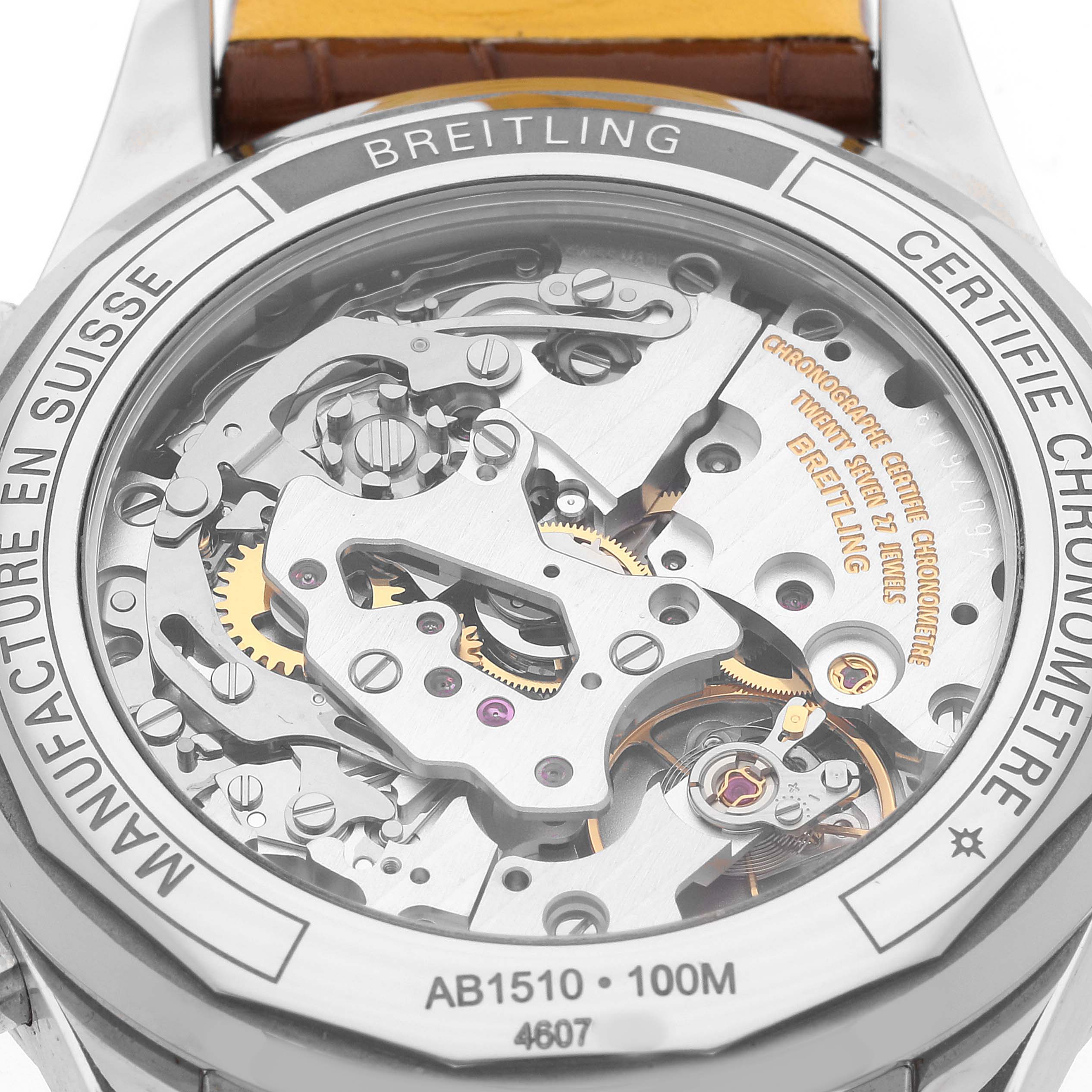 The image shows the back view of a Breitling Premier AB1510 Men's Stainless Steel Blue Dial AB1510 Men's Stainless Steel Blue Dial model, highlighting its intricate movement and "certifie chronometre" engraving.