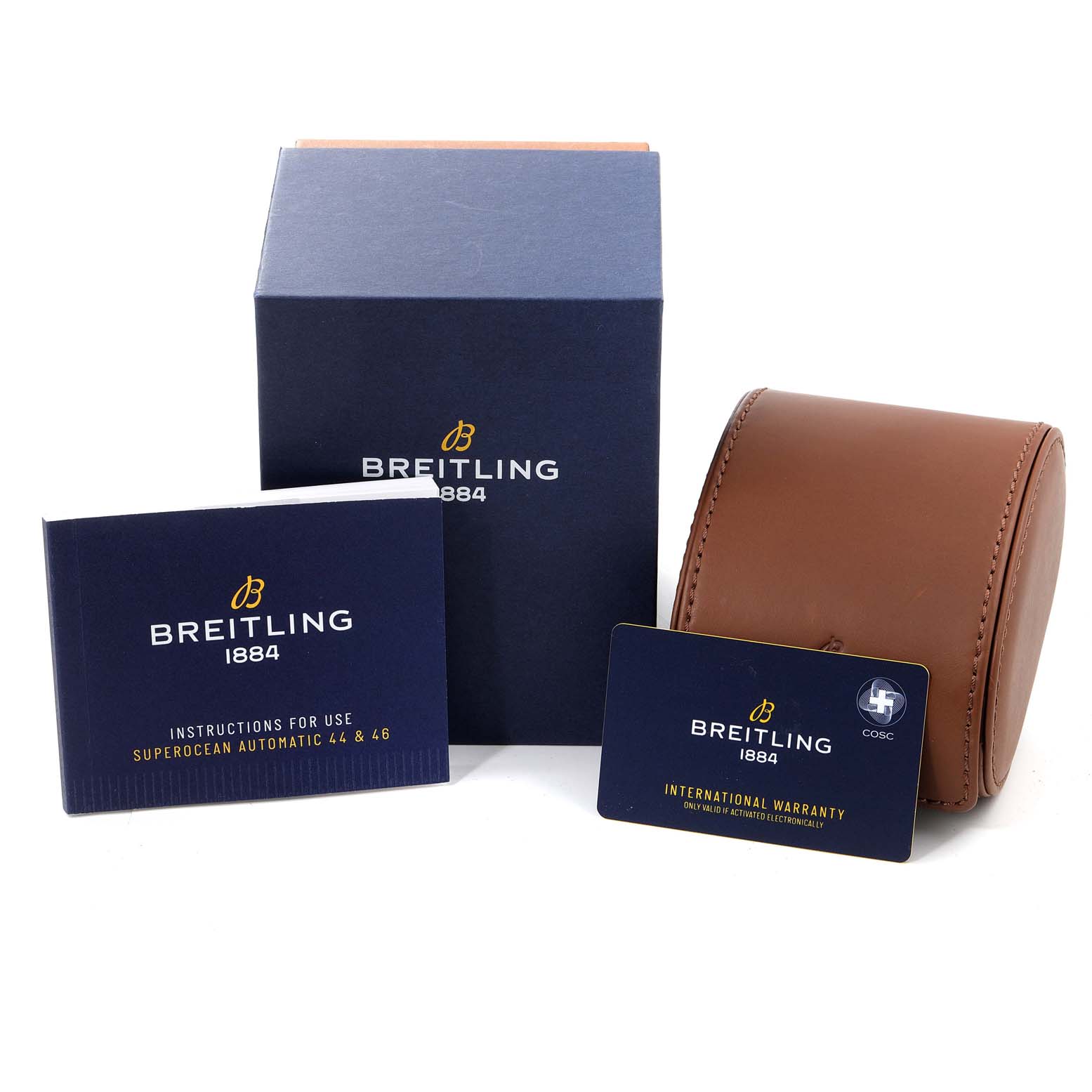 The image shows packaging and accessories for the Breitling Superocean AB2020 Men's Stainless Steel Blue Dial AB2020 Men's Stainless Steel Blue Dial watch, including a box, instruction manual, warranty card, and leather case.