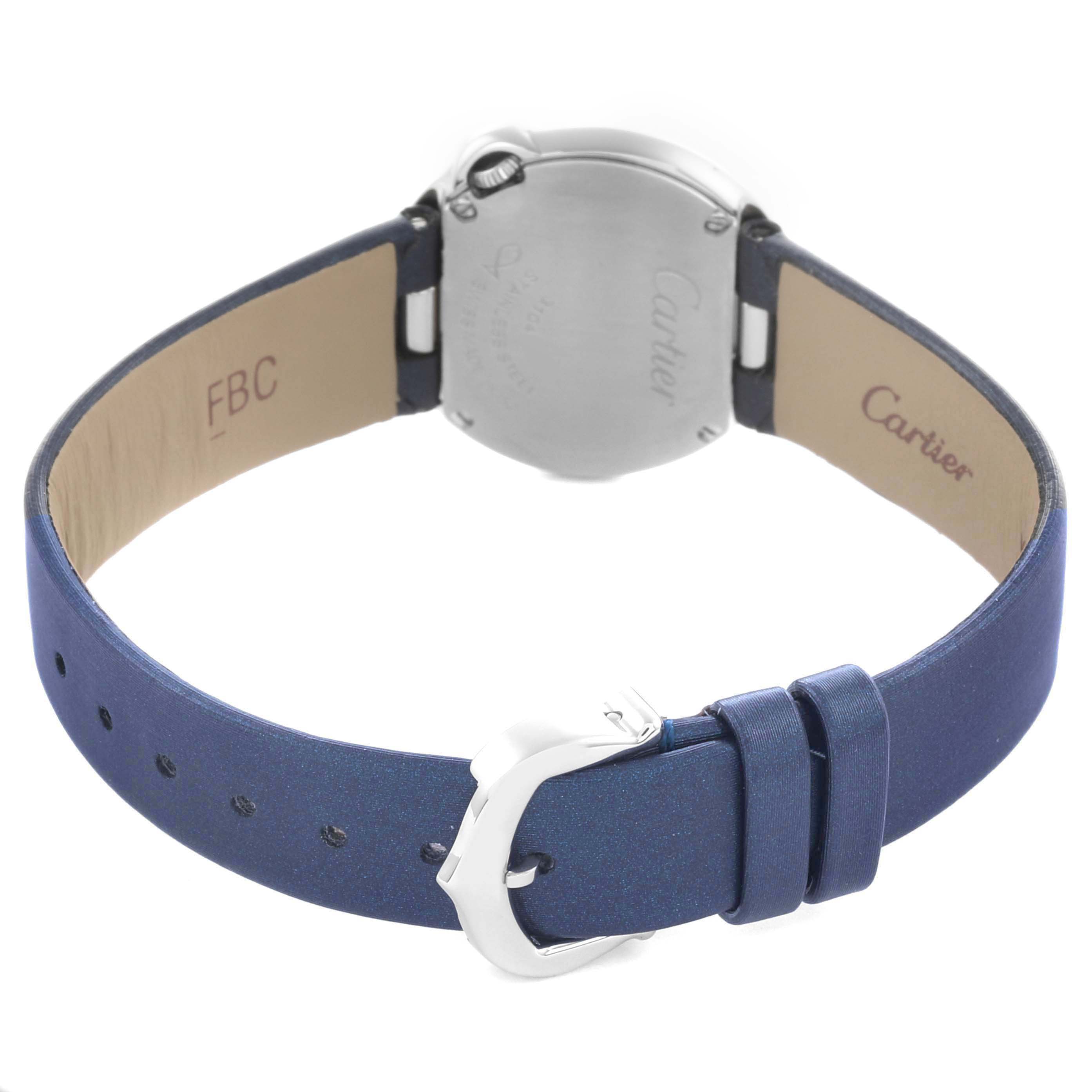 The image shows the back view of a Ballon Blanc by Cartier, highlighting the clasp, strap, and case back.