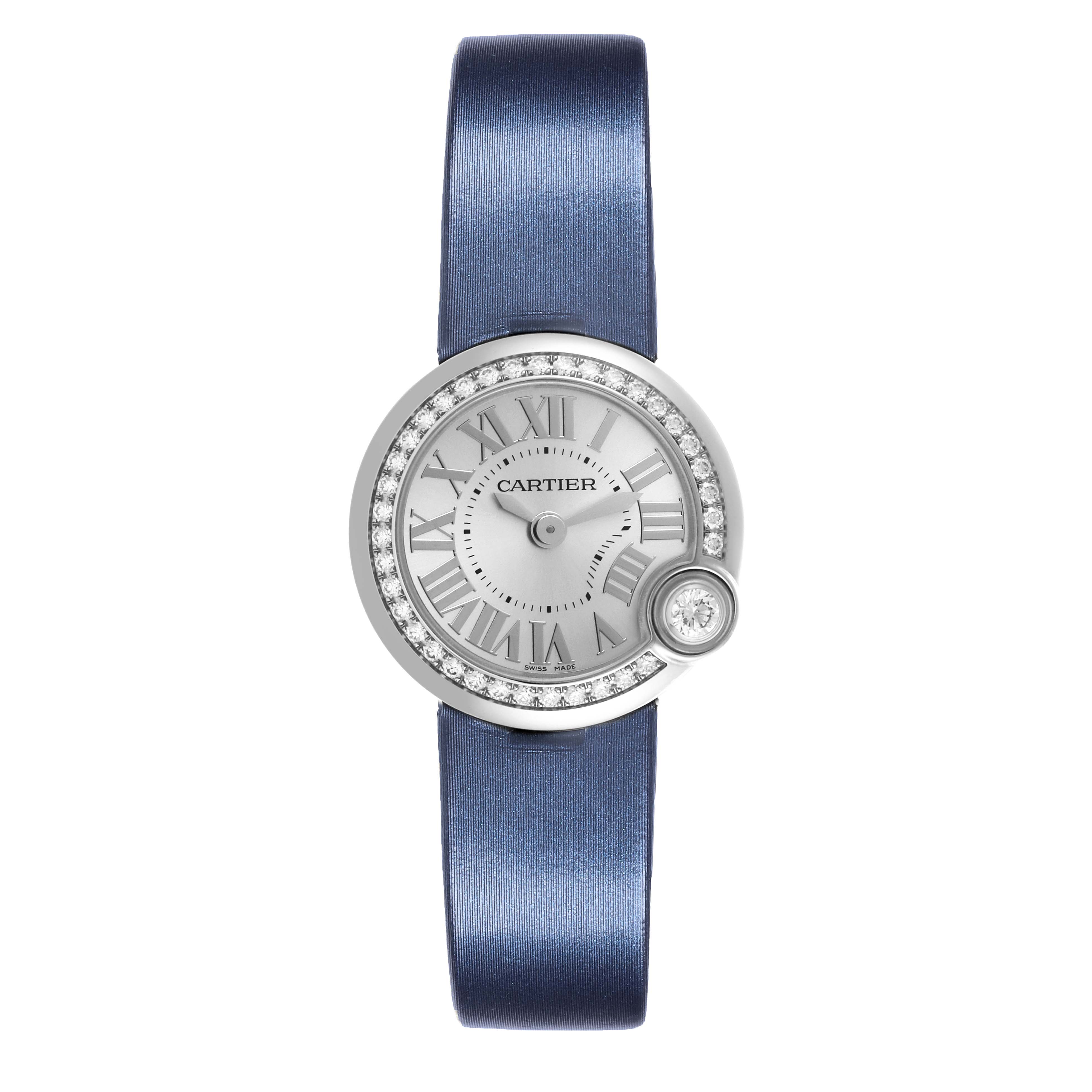 The Cartier Ballon Blanc W4BL0002 Women's Stainless Steel Silver Dial W4BL0002 Women's Stainless Steel Silver Dial watch is shown from a top view, featuring the dial, Roman numerals, diamond bezel, and a blue strap.