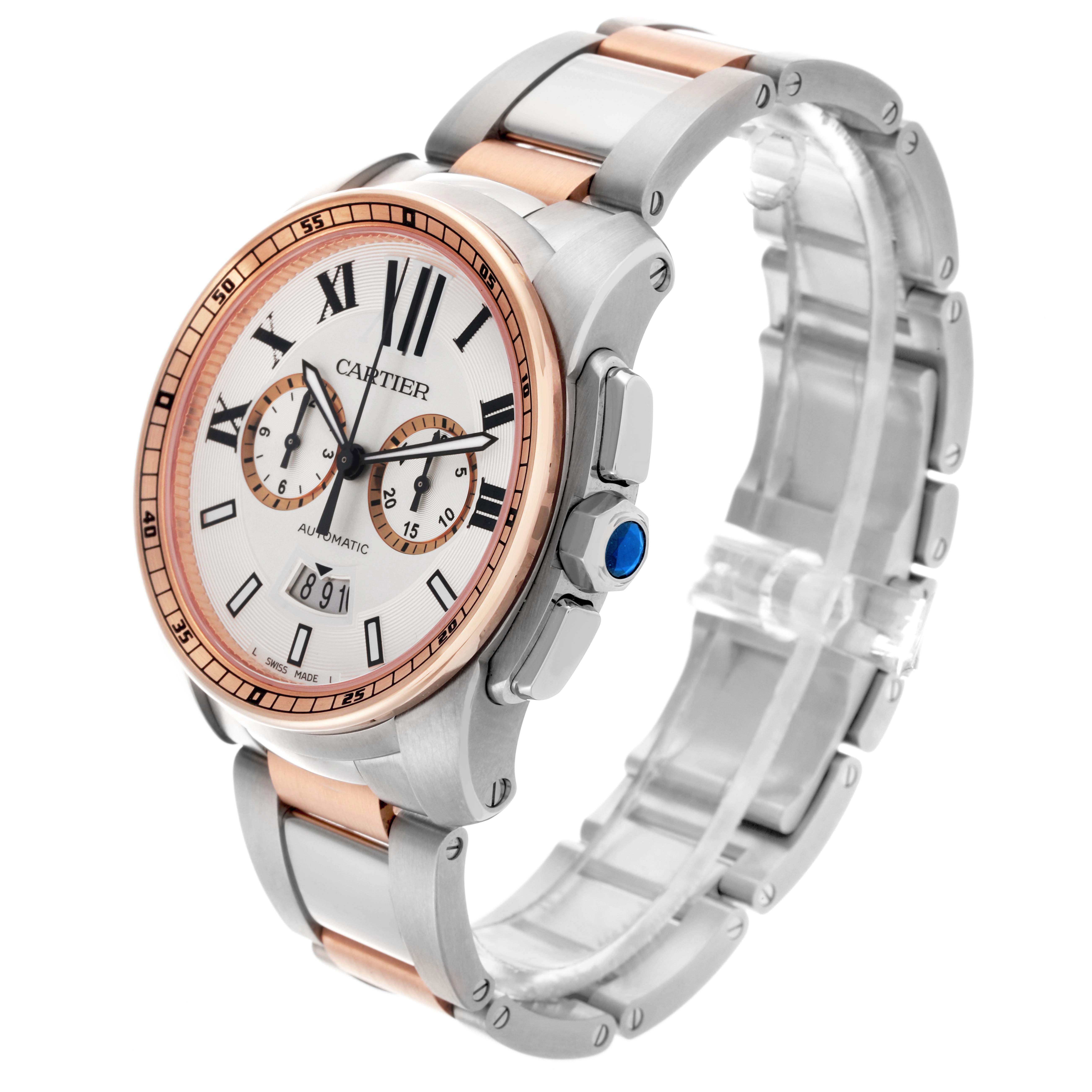 The Calibre de Cartier watch is shown at a three-quarter angle, displaying the face, bezel, bracelet, and crown with a blue cabochon.