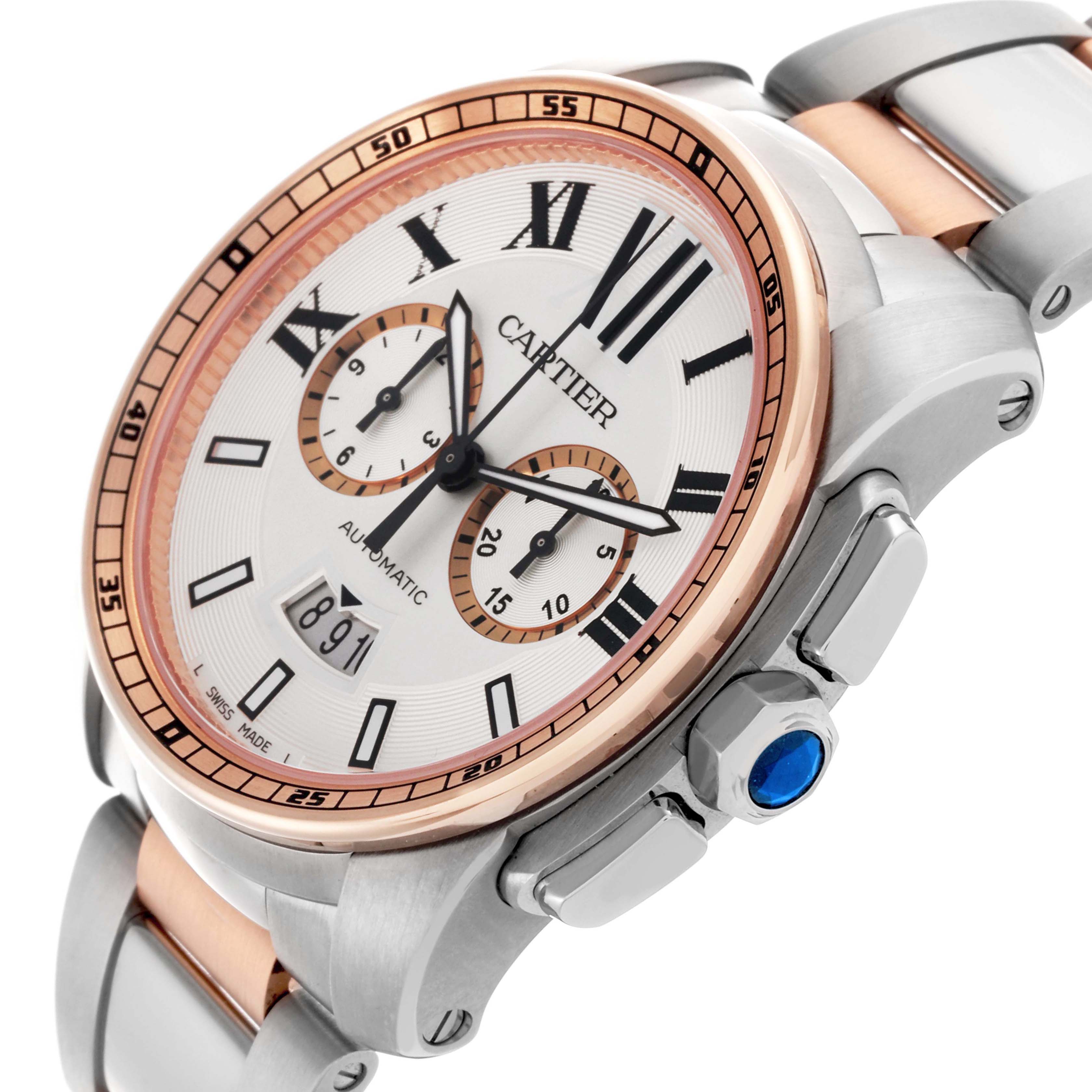 The image shows a Calibre de Cartier watch at a tilted angle, highlighting the dial, bezel, and bracelet links.