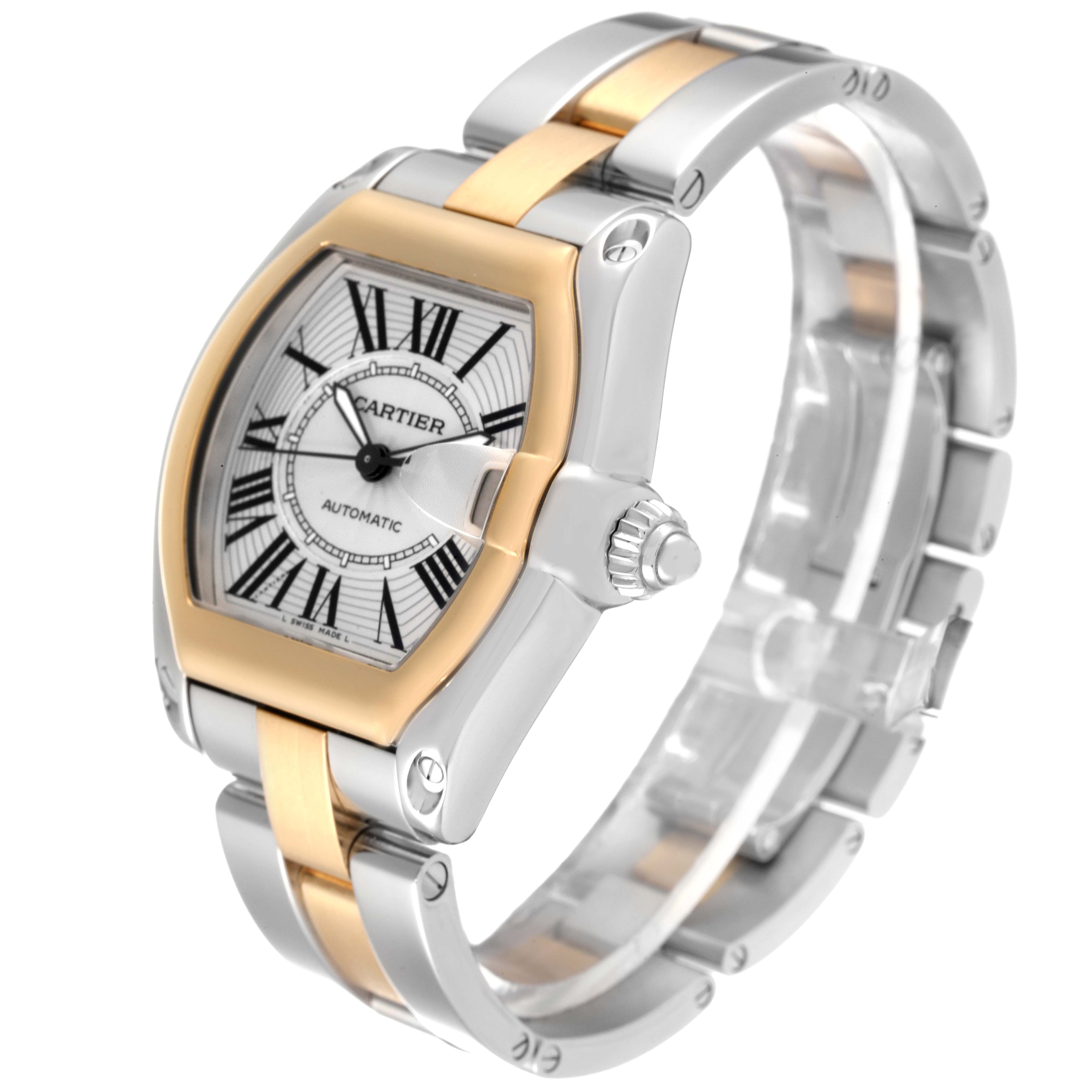 The Cartier Roadster W62031Y4 Men's Steel and Gold (two tone) Silver Dial W62031Y4 Men's Steel and Gold (two tone) Silver Dial watch is shown from a three-quarter angle highlighting its face, bezel, crown, and part of the bracelet.