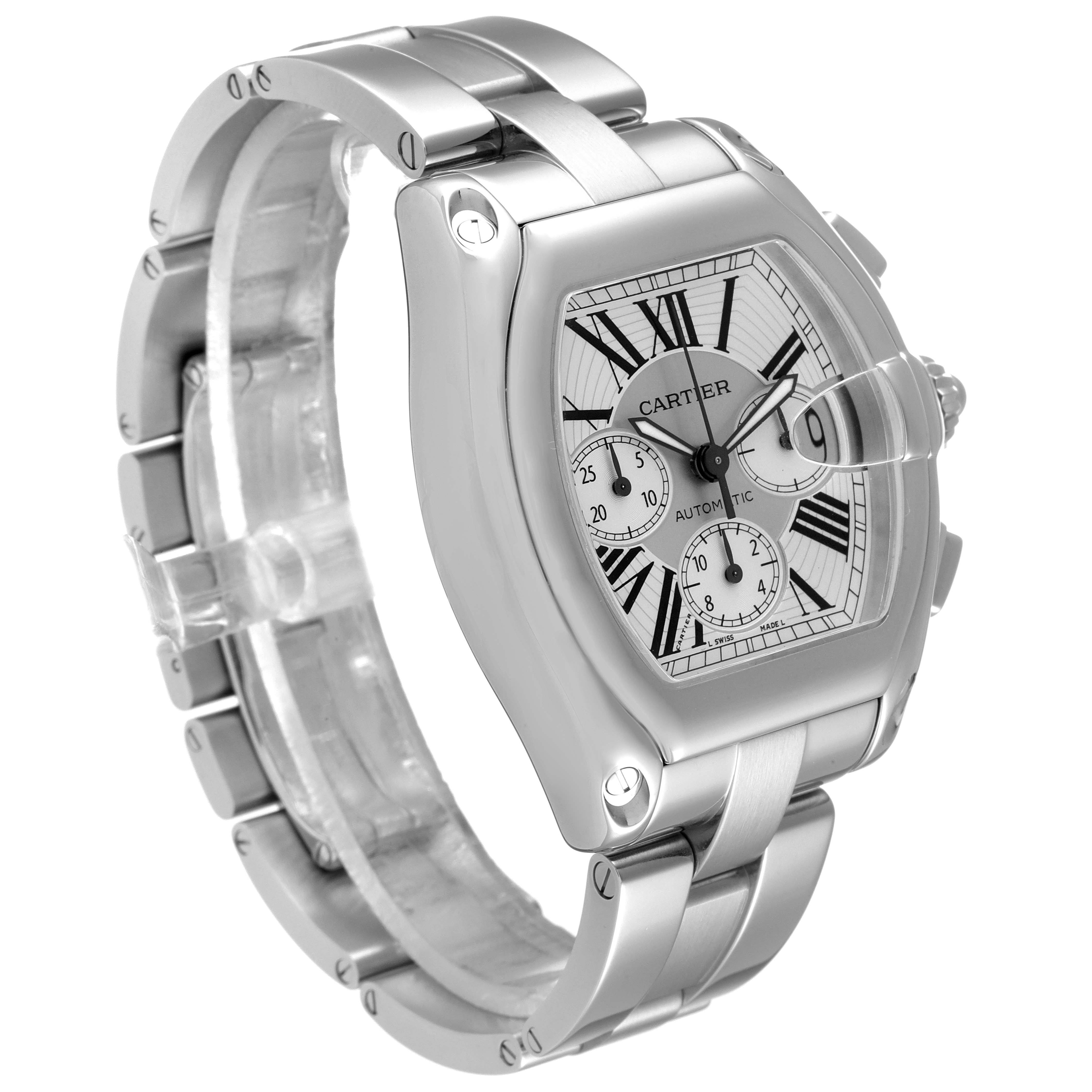 The image displays a Cartier Roadster W62019X6 Men
s Stainless Steel Silver Dial W62019X6 Men
s Stainless Steel Silver Dial watch with a detailed view of its face, bracelet, and crown from a three-quarter angle.