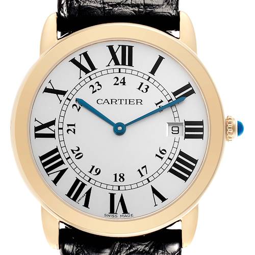 The Cartier Ronde watch is shown from the front, displaying its face, Roman numerals, and crown with a blue cabochon.