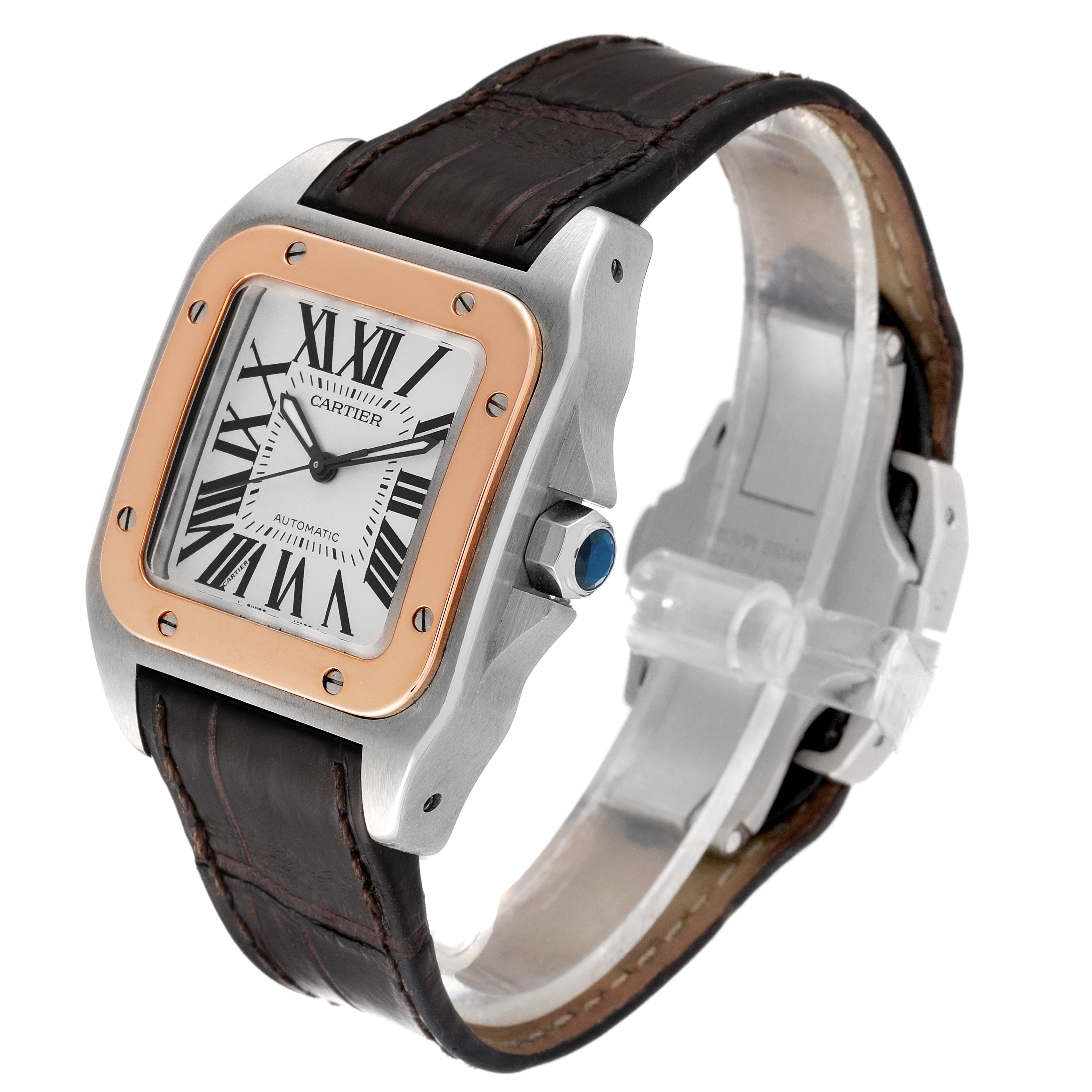 The Cartier Santos W20106X8 Men's Steel and Gold (two tone) Silver Dial W20106X8 Men's Steel and Gold (two tone) Silver Dial watch is shown at an angled view, displaying its face, bezel, crown, and leather strap.