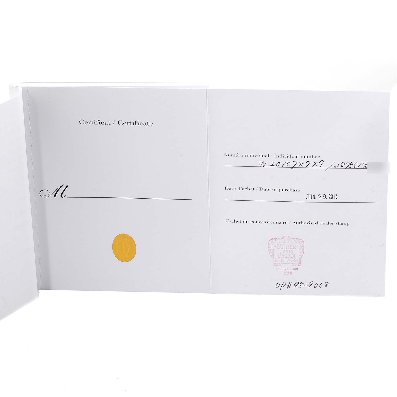 This image shows the open warranty certificate for the Santos model by Cartier.