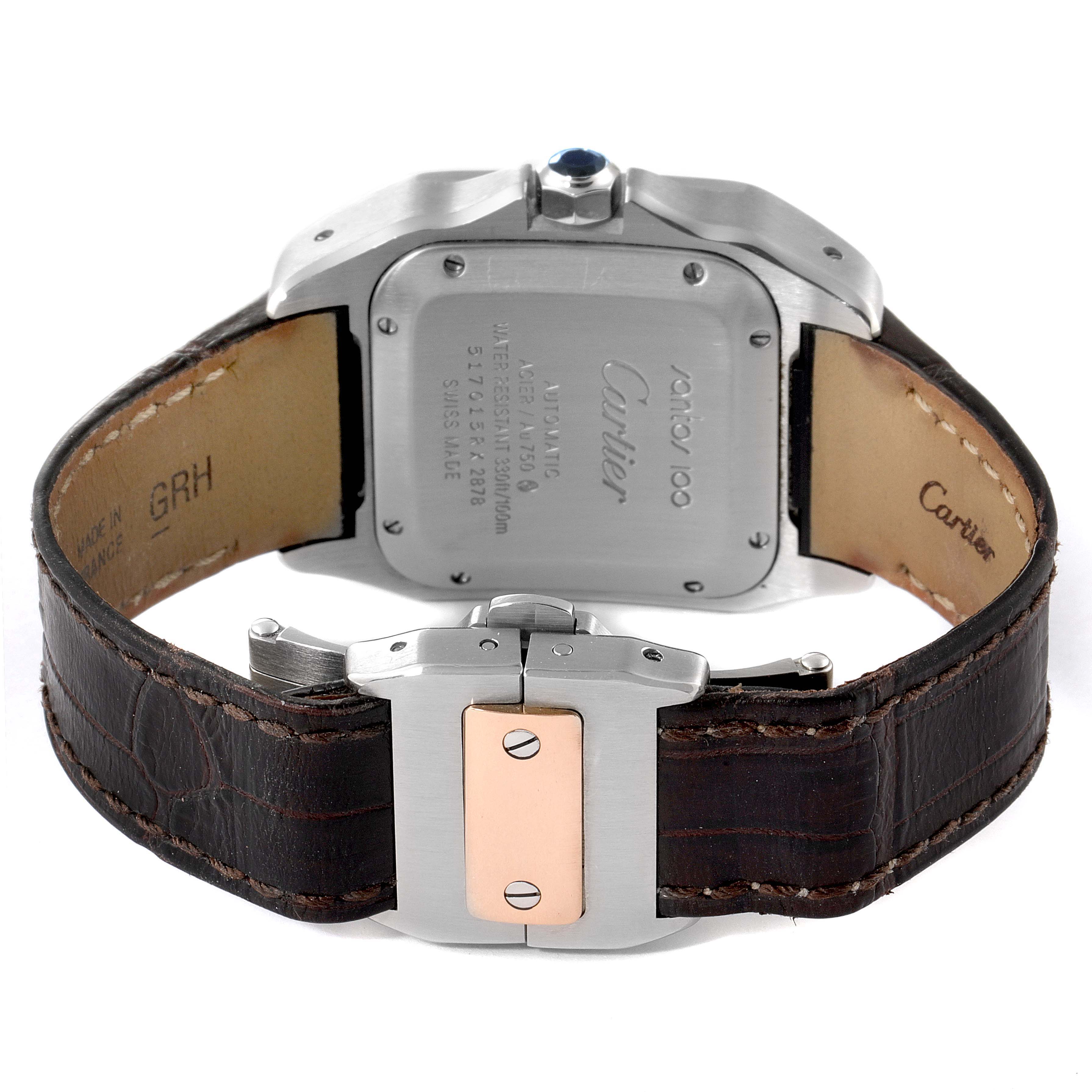 The image shows the back view of a Cartier Santos W20106X8 Men's Steel and Gold (two tone) Silver Dial W20106X8 Men's Steel and Gold (two tone) Silver Dial watch, highlighting its case back, leather strap, and clasp details.