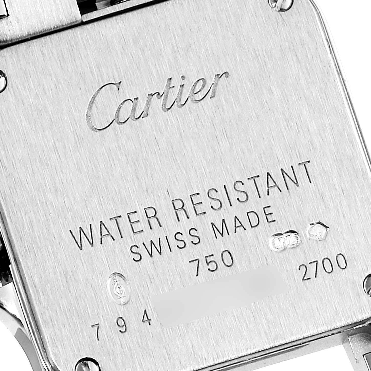 The image shows the back case of a Cartier Santos Demoiselle WF9005Y8 Women's White Gold Silver Dial WF9005Y8 Women's White Gold Silver Dial watch, highlighting its water resistance and Swiss-made inscription.