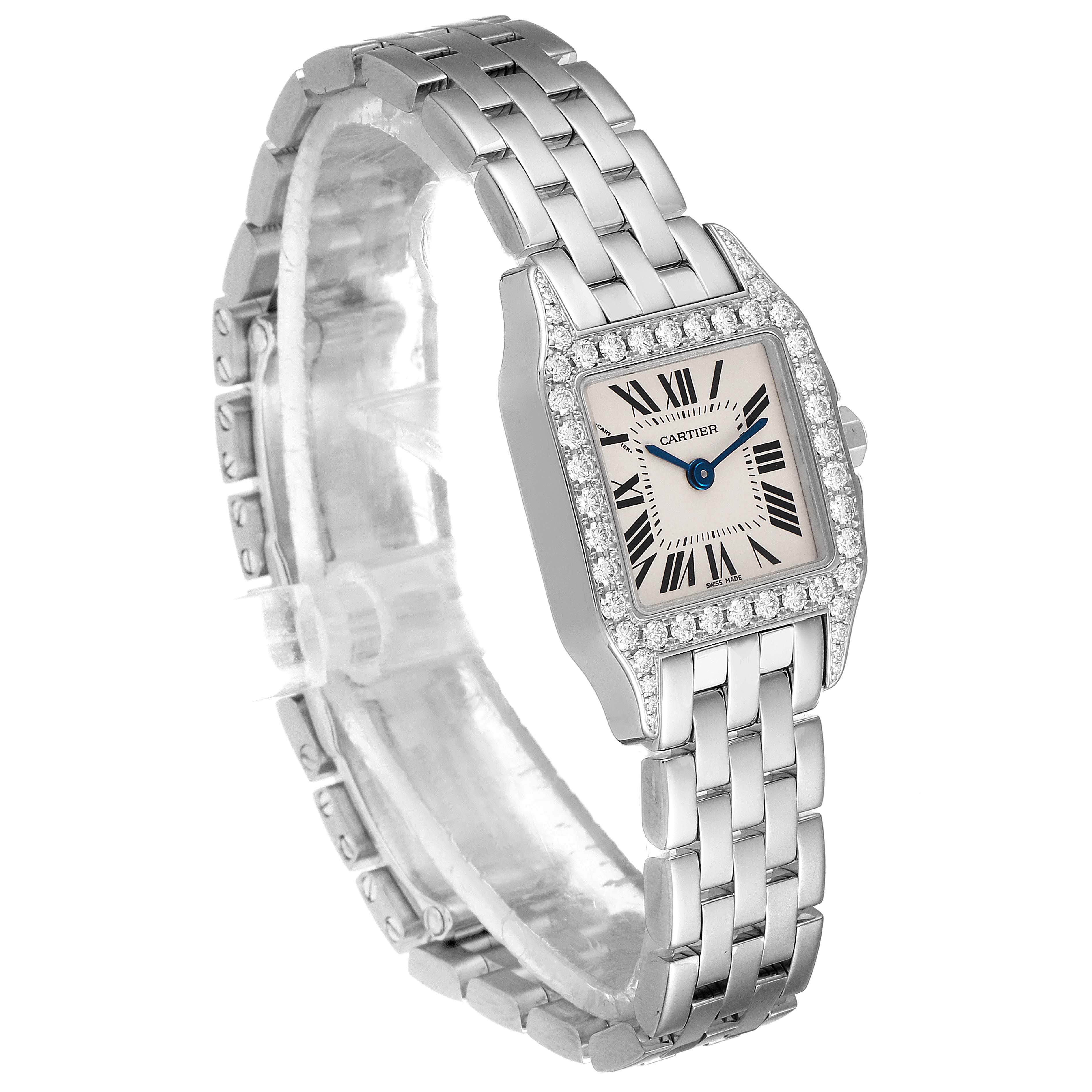 The image shows a Cartier Santos Demoiselle WF9005Y8 Women's White Gold Silver Dial WF9005Y8 Women's White Gold Silver Dial watch at a slightly angled side view, displaying the bracelet, dial, and diamond-set bezel.