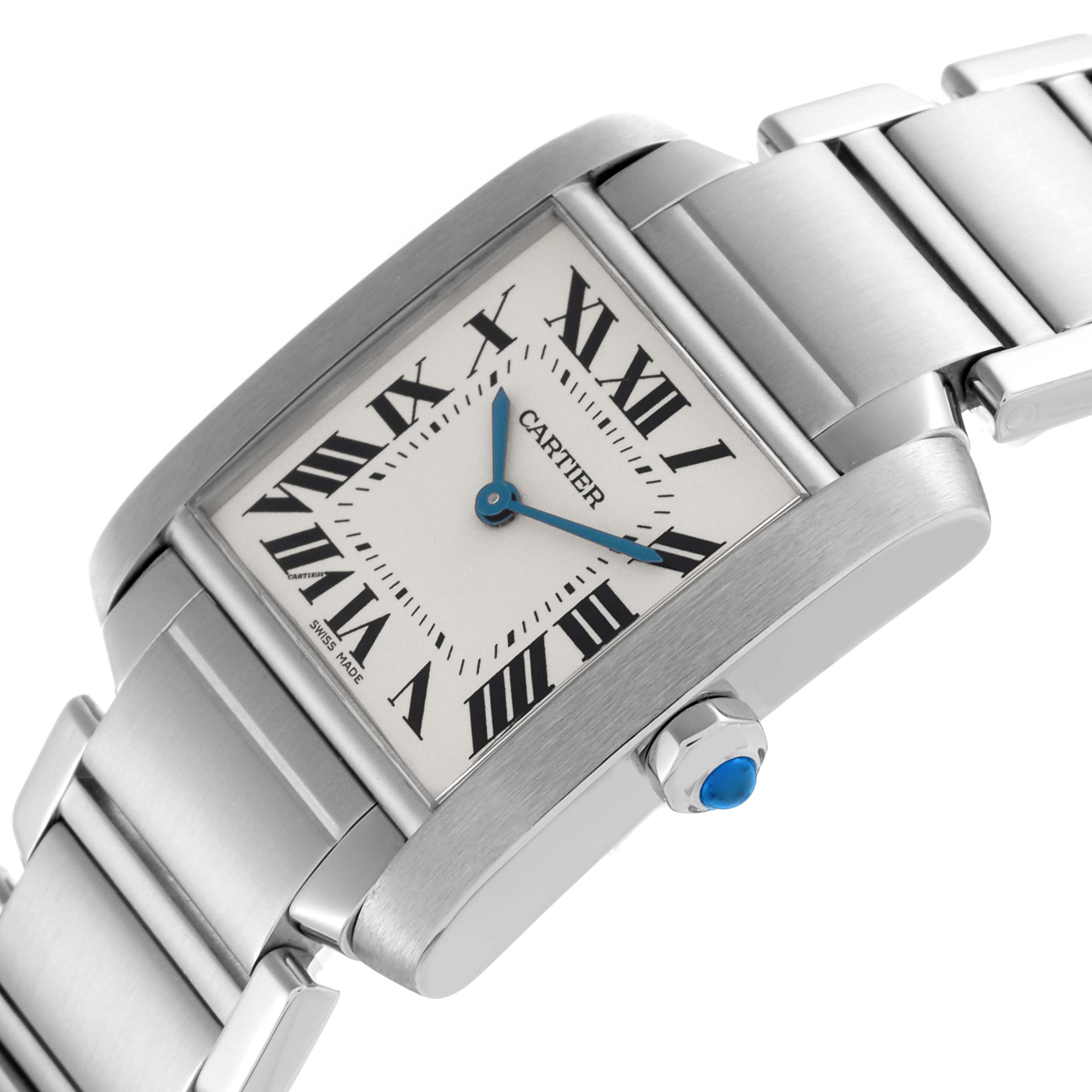 The Cartier Tank Française watch is shown at an angle, highlighting the face, Roman numerals, and crown with a blue gemstone.