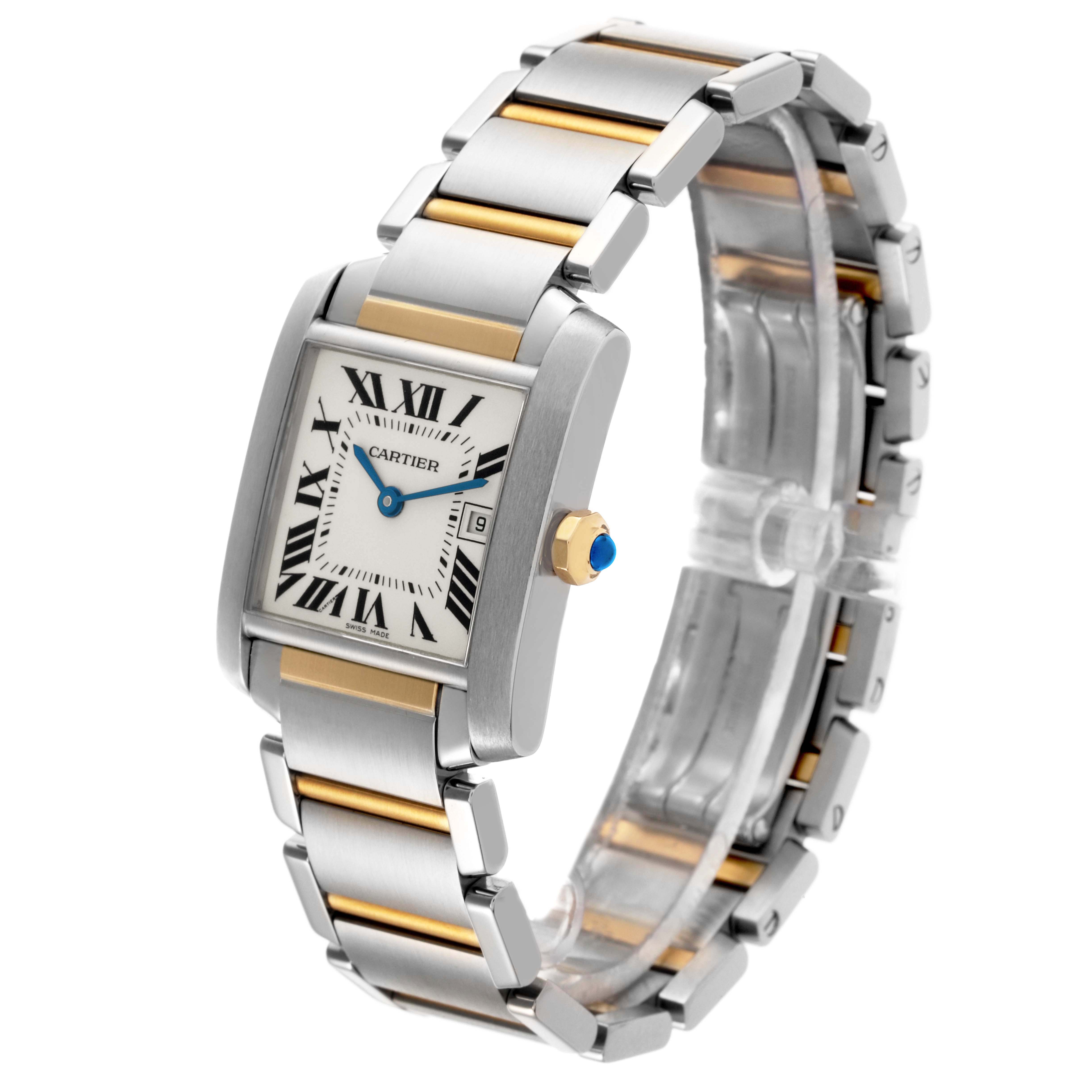 The Cartier Tank Française watch is angled to show the face, bracelet, and crown with its blue cabochon.