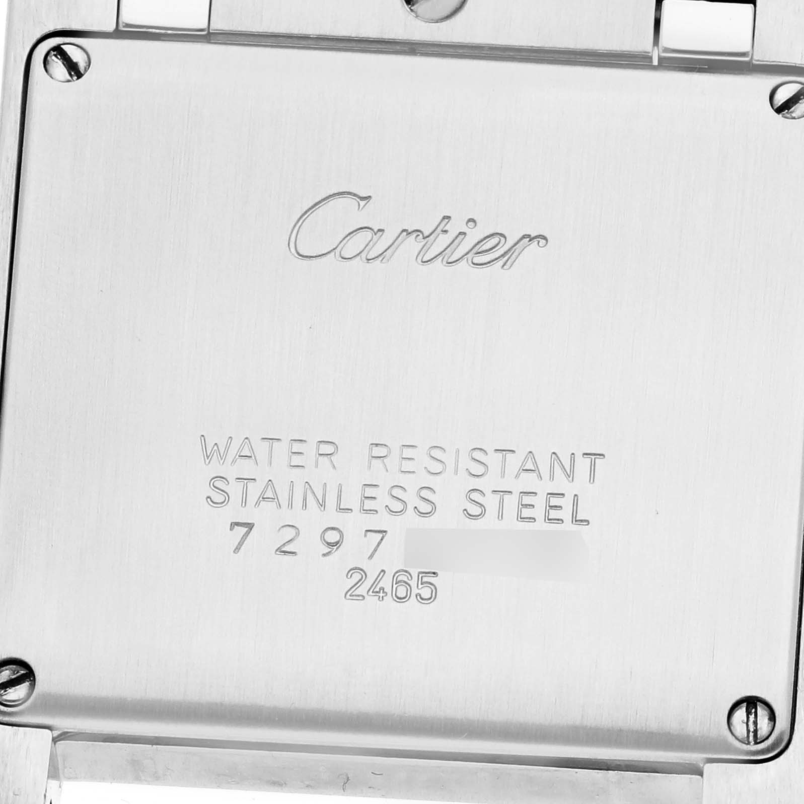 The image shows the back case of a Cartier Tank Française watch, highlighting brand engraving and specifications.