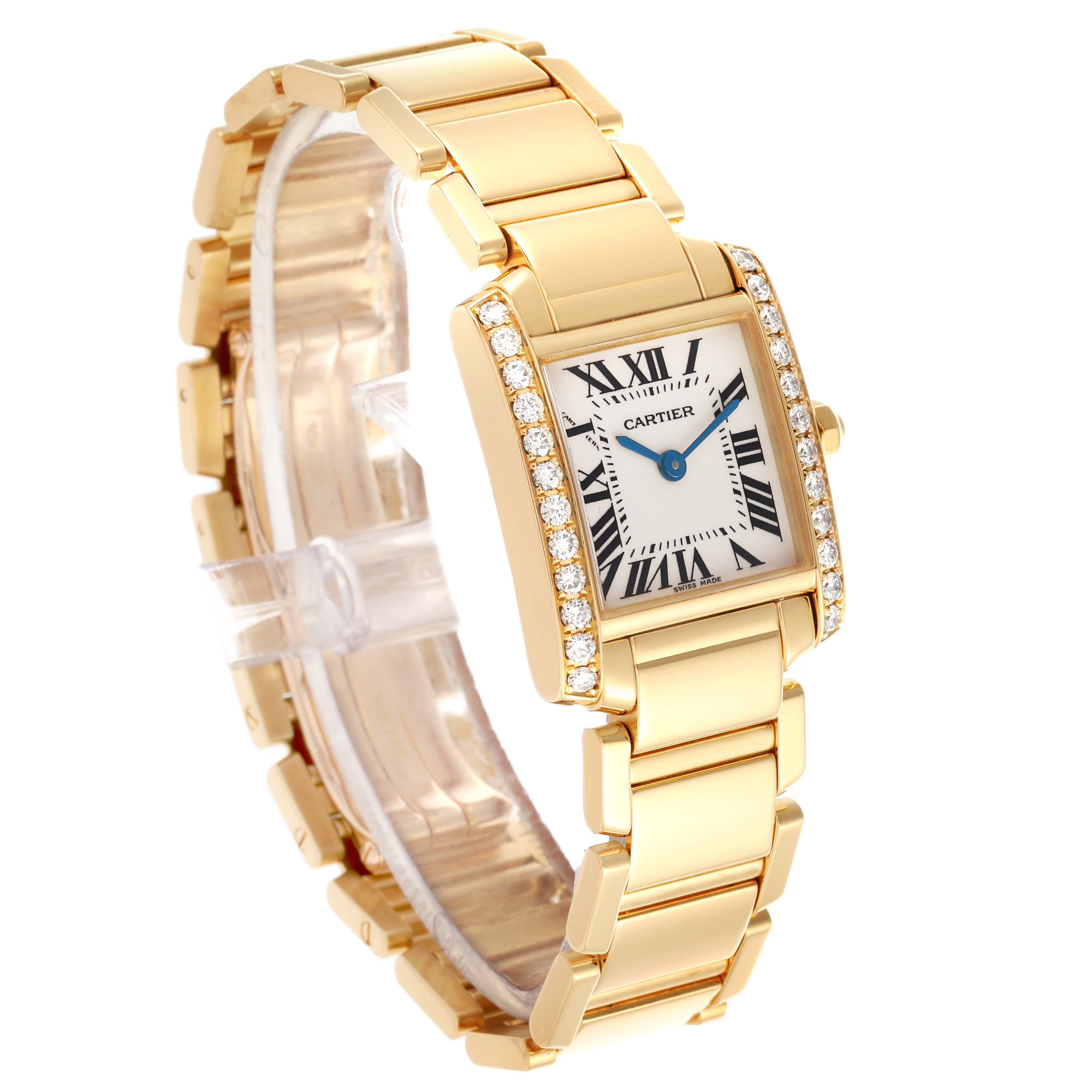 The Cartier Tank Française watch is shown from a three-quarter angle, highlighting its gold bracelet and diamond-set bezel.