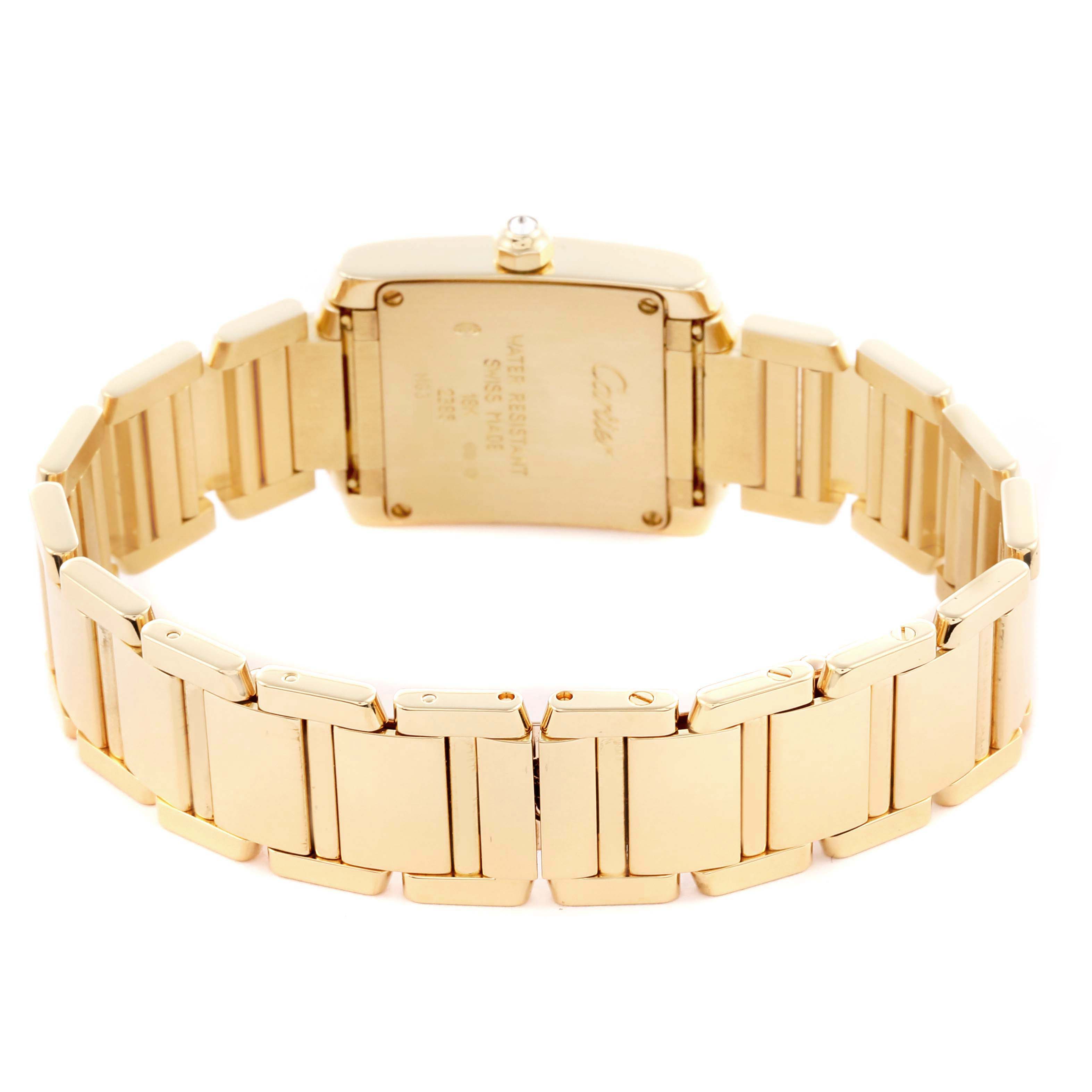 This image shows the back and bracelet of the Cartier Tank Française watch, highlighting its gold finish and clasp.