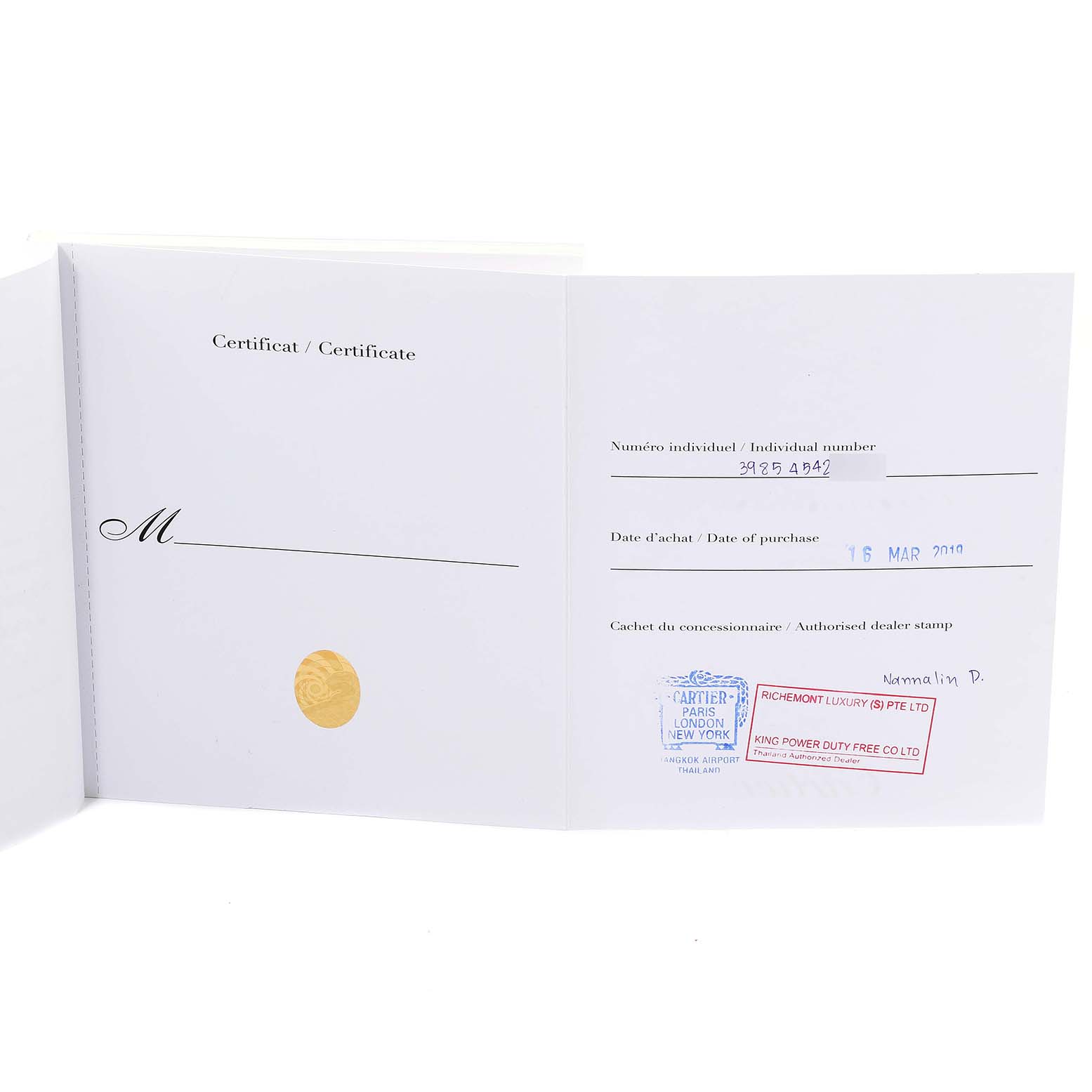 This image shows the certificate of authenticity and purchase details for the Tank Louis model by Cartier.