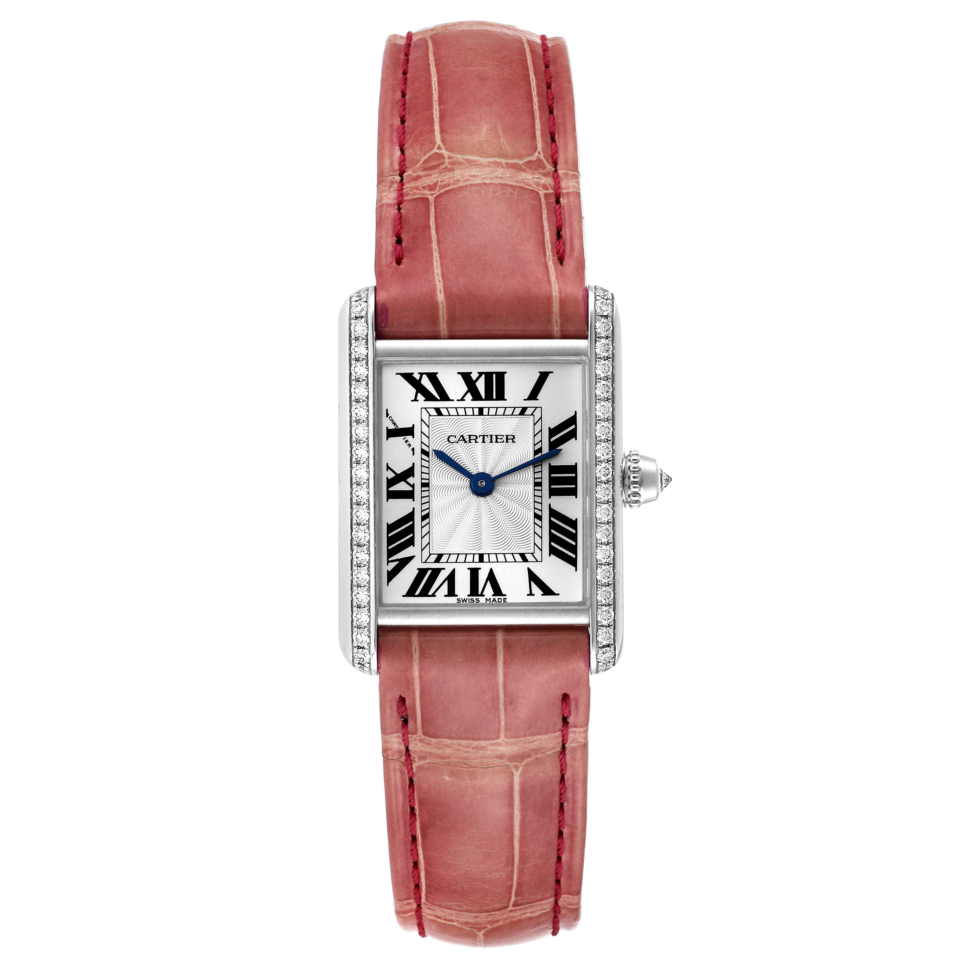 This image shows a Tank Louis watch by Cartier, featuring its rectangular face and leather strap from a top-down view.