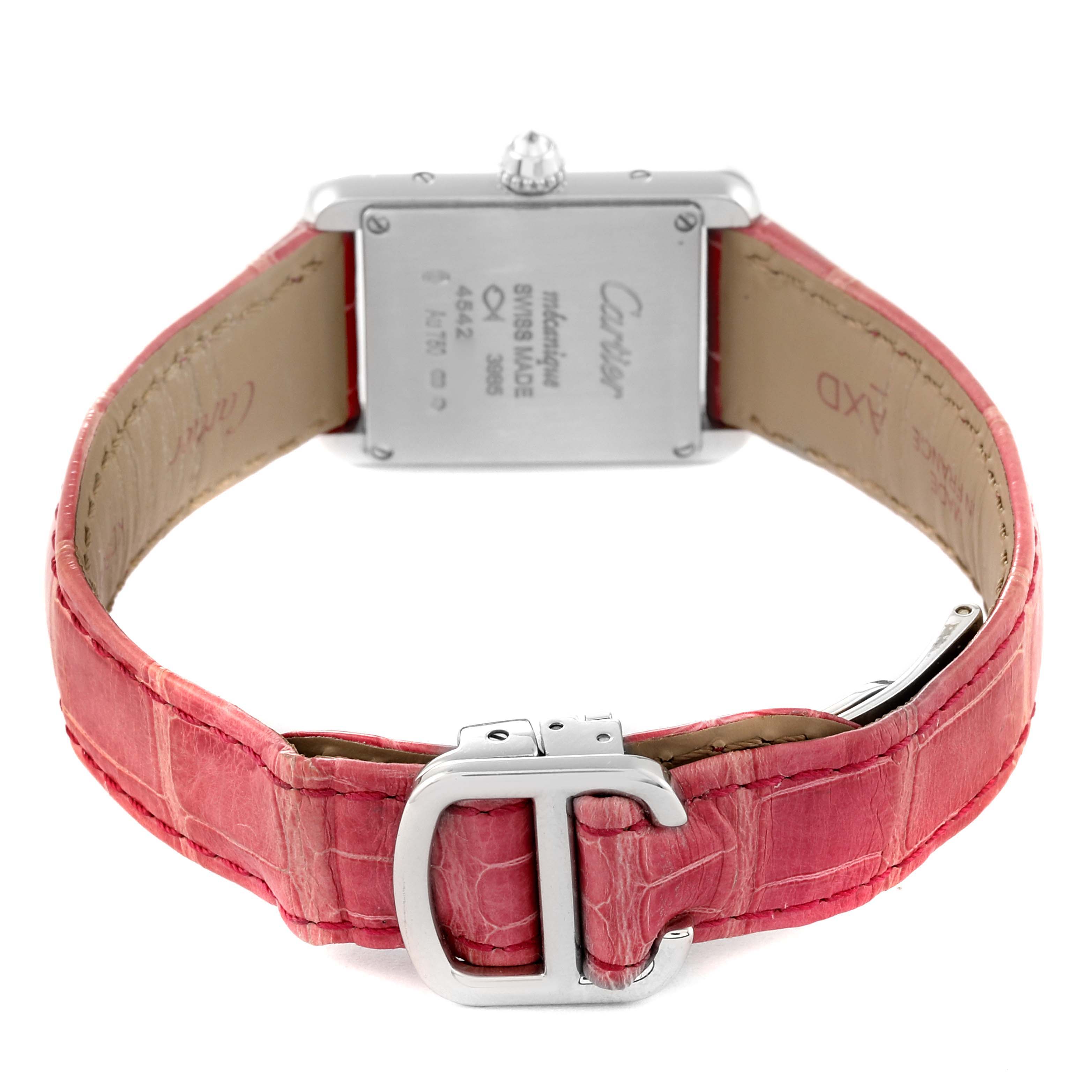 The image shows the back view of a Cartier Tank Louis WJTA0011 Women's White Gold Silver Dial WJTA0011 Women's White Gold Silver Dial watch with a pink leather strap and a stainless steel buckle.