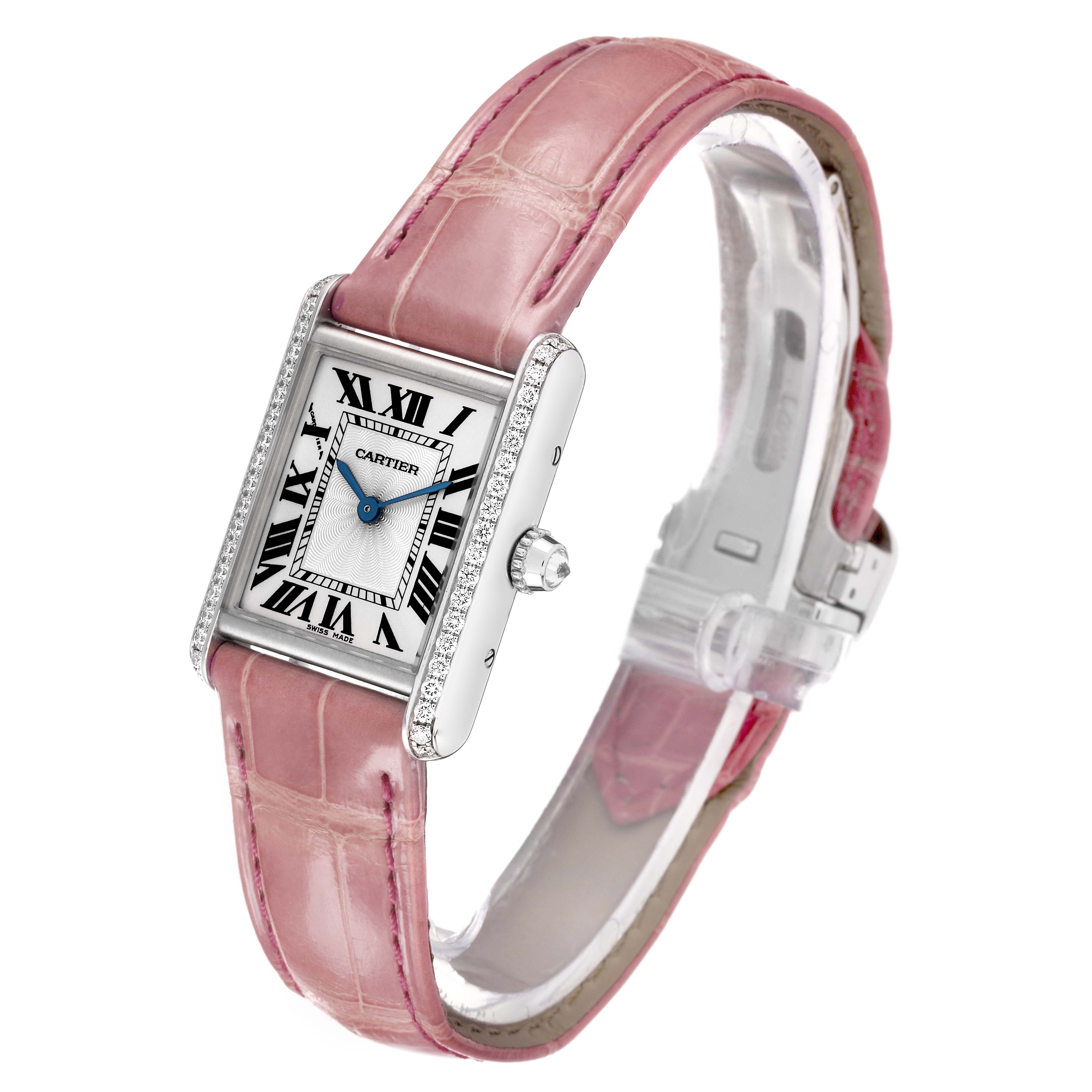 The Cartier Tank Louis WJTA0011 Women's White Gold Silver Dial watch is shown at an angle displaying the dial, strap, and side with gemstones.