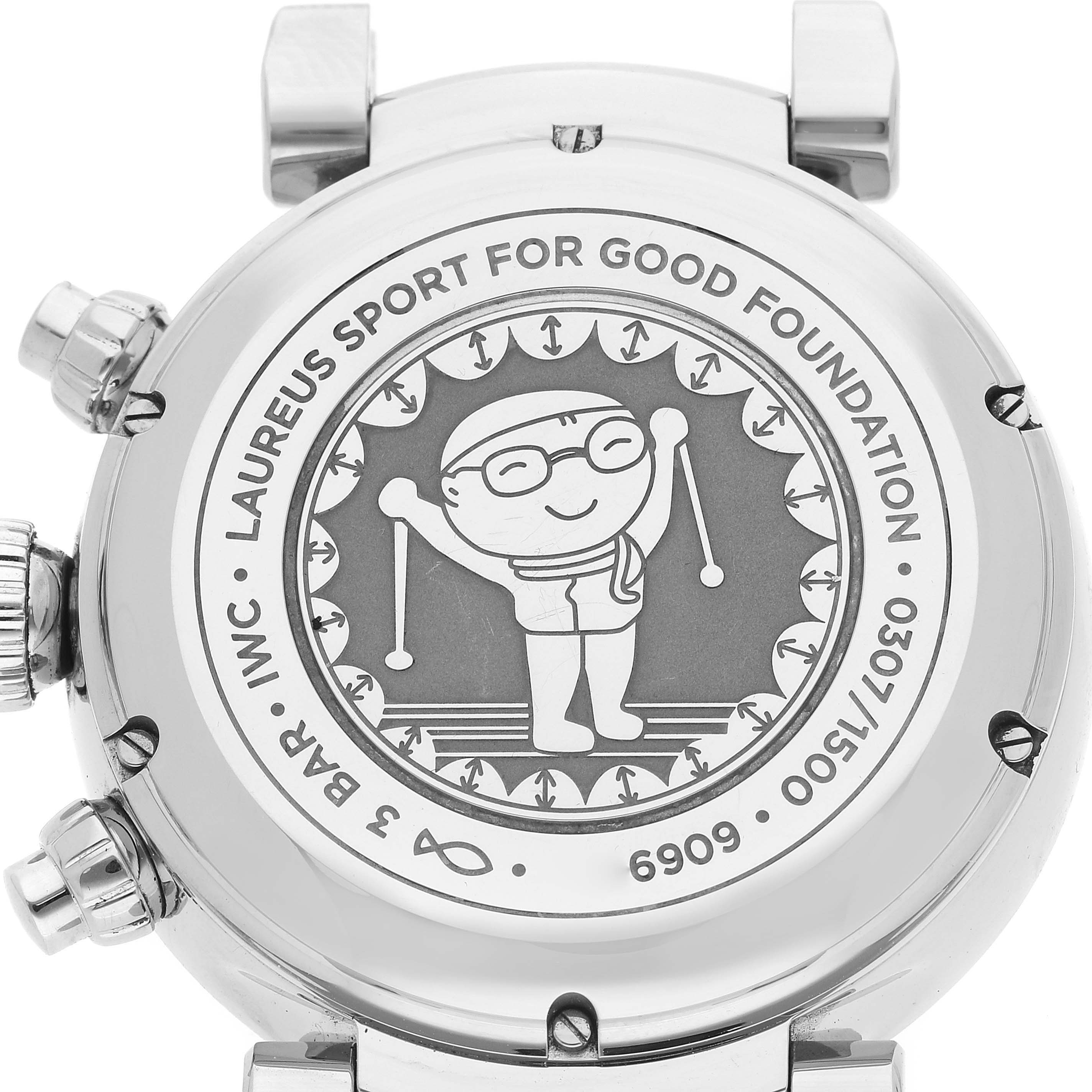 The image shows the back case of an IWC Da Vinci IW393402 Men's Stainless Steel Blue Dial IW393402 Men's Stainless Steel Blue Dial watch, featuring an engraving related to the Laureus Sport for Good Foundation.