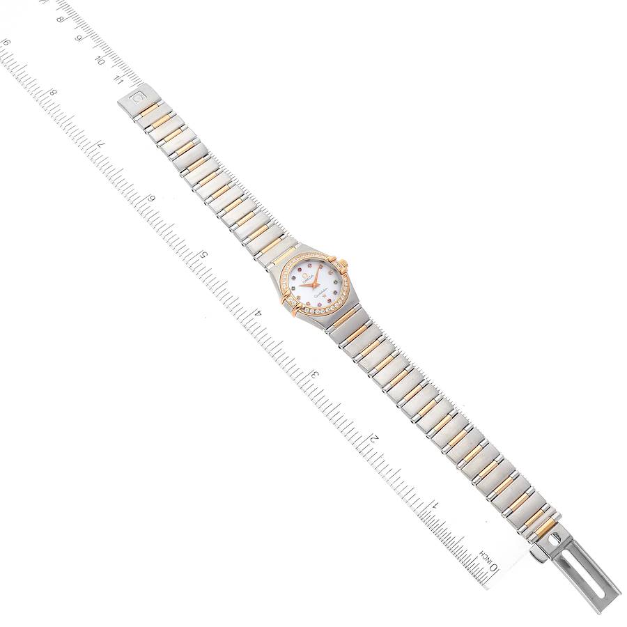 The image shows the front angle of the Omega 1360.79.00 Women's Steel and Gold (two tone) Mother of Pearl Dial 1360.79.00 Women's Steel and Gold (two tone) Mother of Pearl Dial Constellation Iris Steel Rose Gold MOP Diamond Ladies Watch 1360.79.00 with its full band and clasp extended.