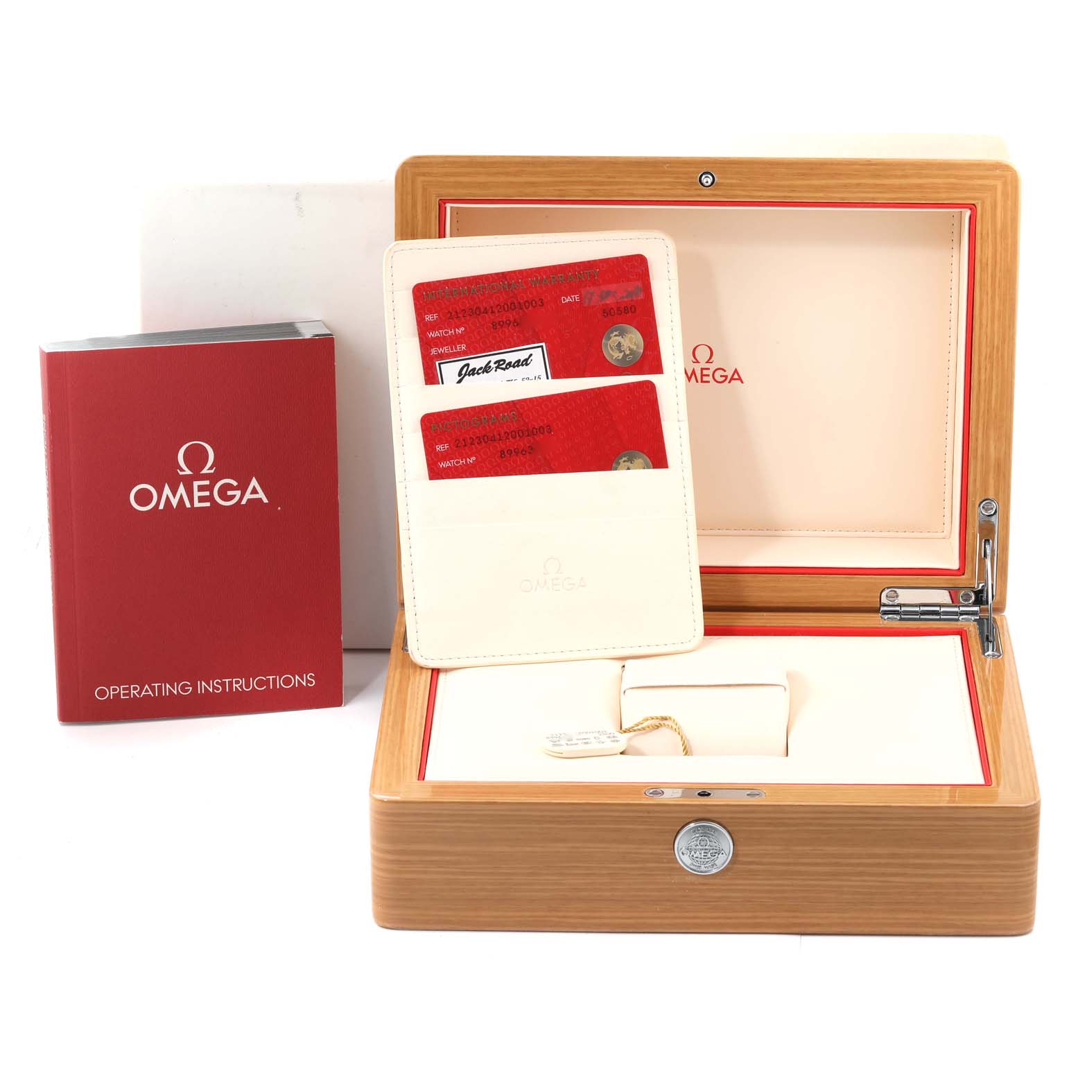 This image shows an Omega Seamaster 212.30.41.20.01.003 Men's Stainless Steel Black Dial 212.30.41.20.01.003 Men's Stainless Steel Black Dial watch box, warranty cards, and an operating instructions booklet.